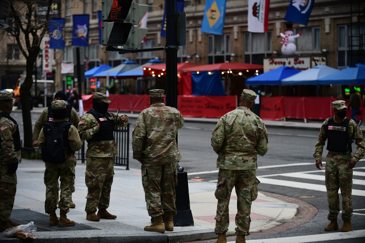 D.C. National Guard arrives at 12th Street near Hotel Harrington, a popular hangout for Pro-Trump supporters and Proud Boys. MUST CREDIT: Photo by Astrid Riecken for The Washington Post.