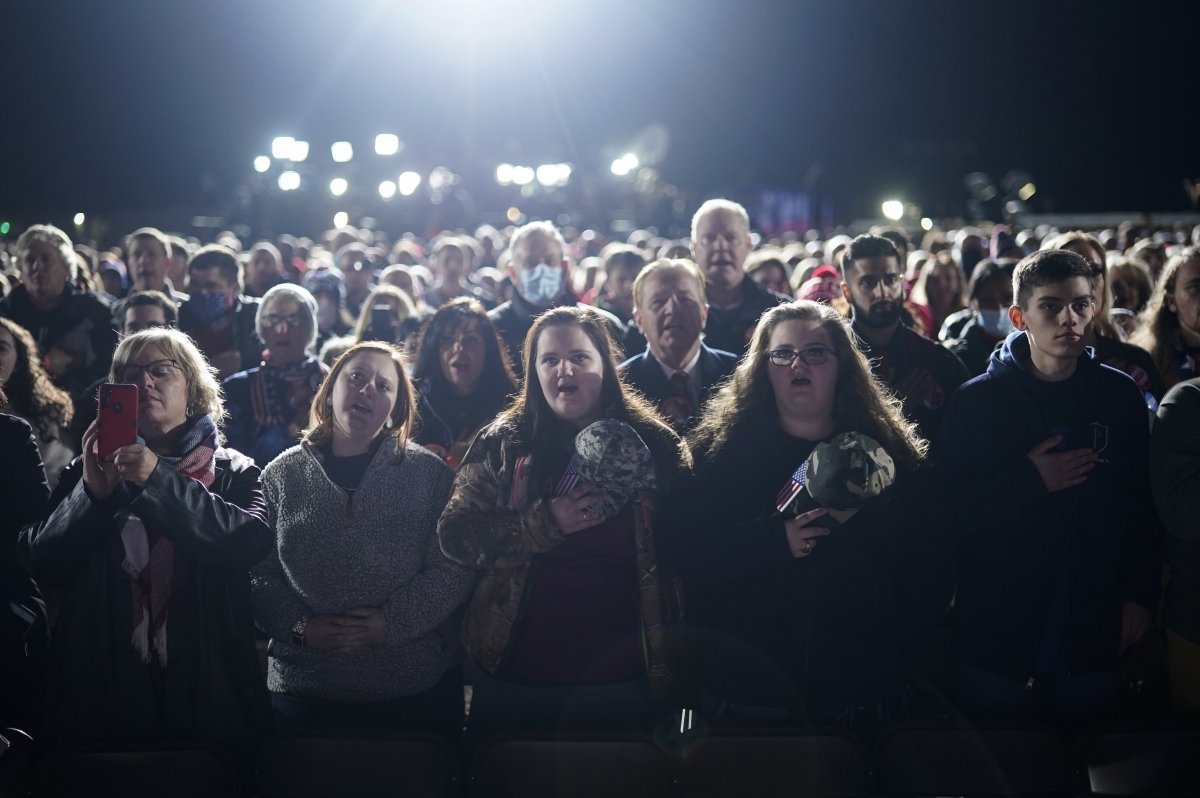 Supporters wait for President Donald Trump at Monday's rally. MUST CREDIT: Washington Post photo by Jabin Botsford