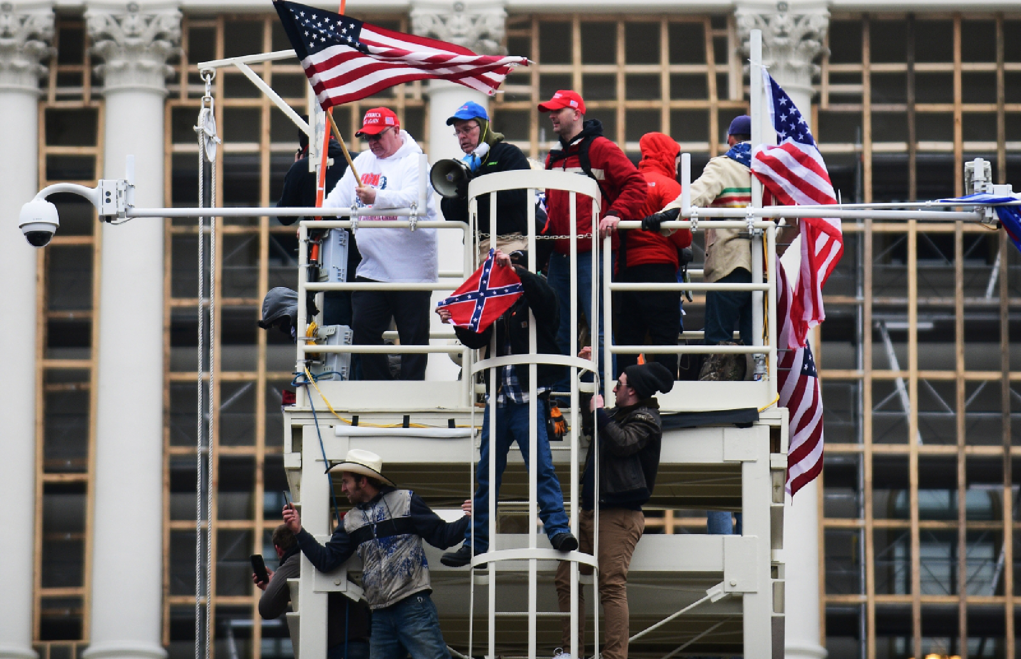 A mob riots at the U.S. Capitol in support of President Donald Trump on Wednesday, Jan. 6, 2021. MUST CREDIT: Photo for The Washington Post by Astrid Reicken