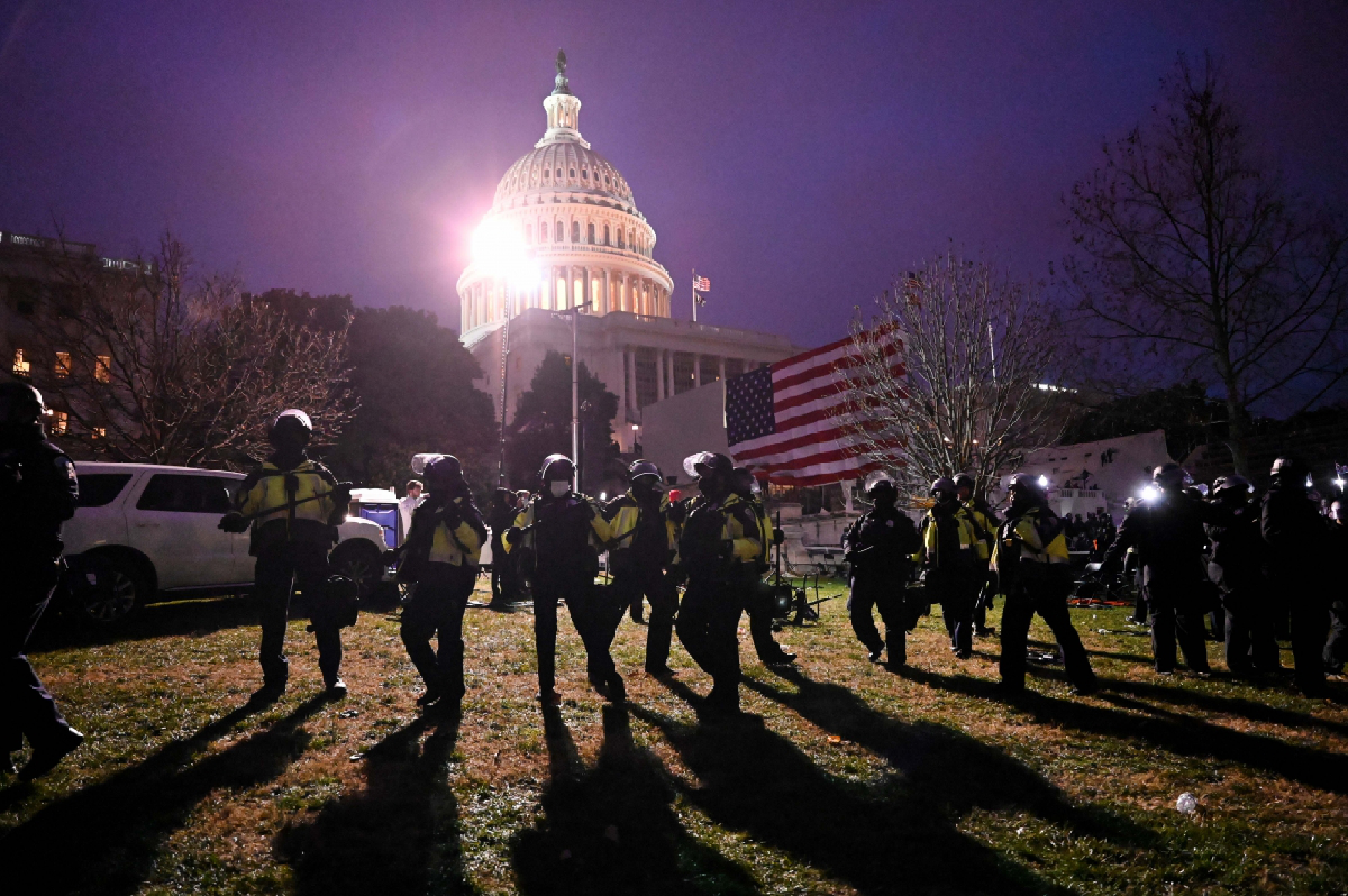 Police clear the U.S. Capitol grounds after a pro-Trump mob rioted there on Wednesday, Jan. 6, 2021. MUST CREDIT: Washington Post photo by Katherine Frey