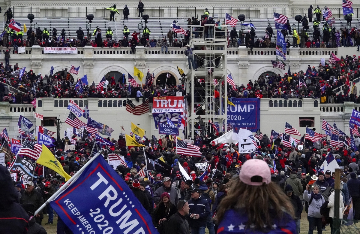 The scene Jan. 6 outside the Capitol after a mob of Trump supporters breached the building in a violent riot. MUST CREDIT: Washington Post photo by Bonnie Jo Mount