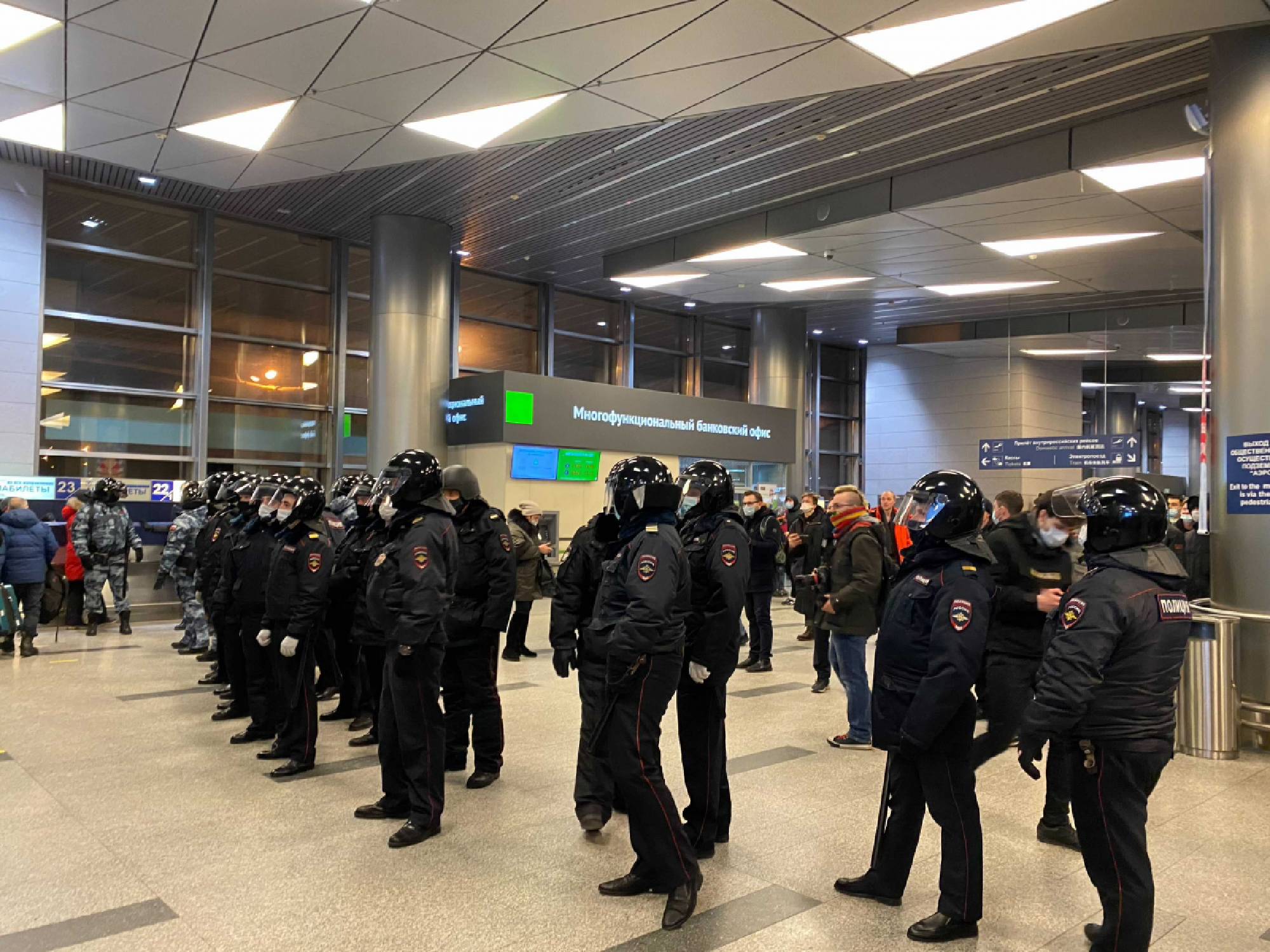 Riot police at Moscow's Vnukovo International Airport await Alexei Navalny's return. MUST CREDIT: Washington Post photo by Isabelle Khurshudyan