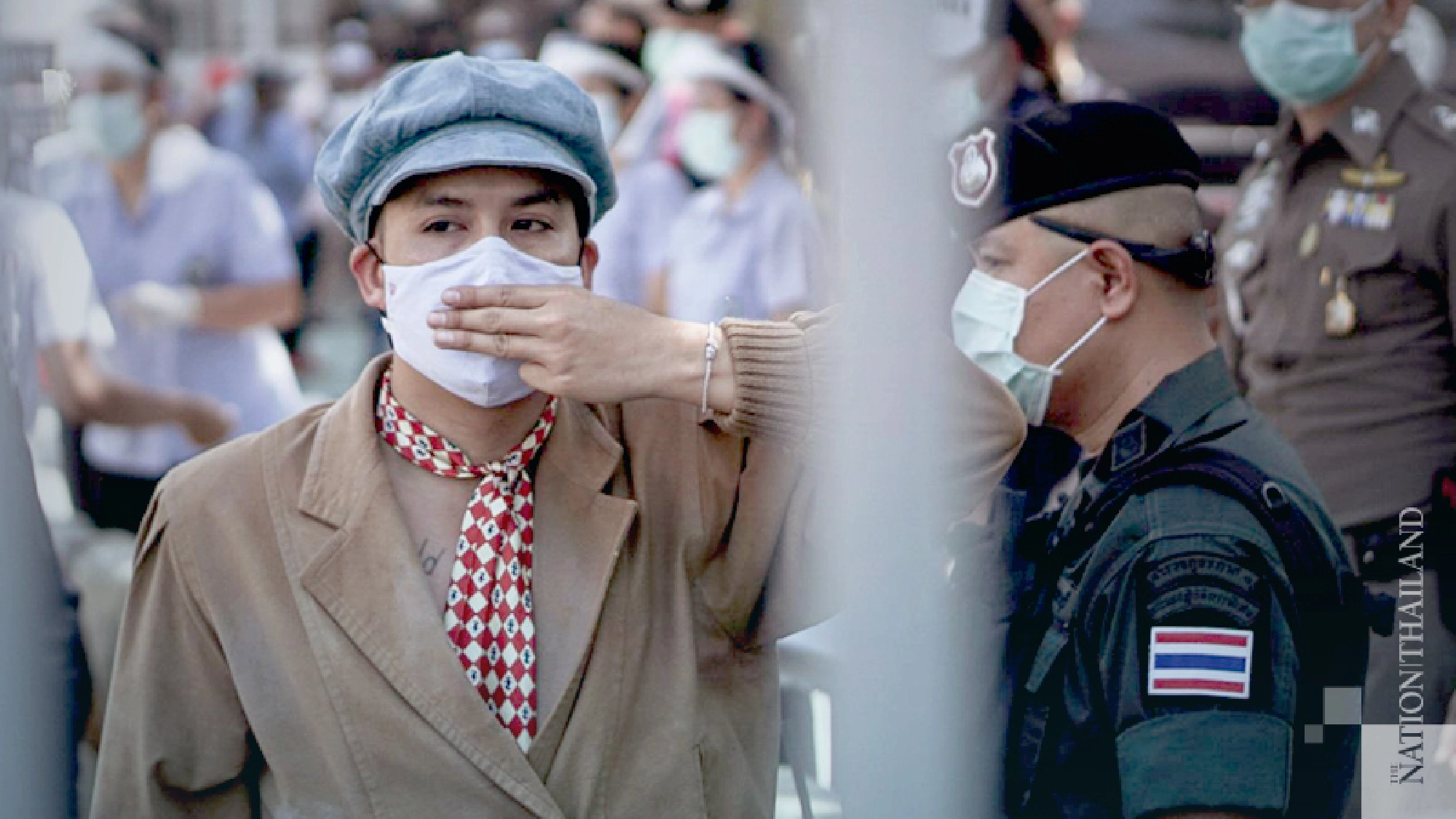 Parit, Panusaya among 22 protesters charged over rally last month