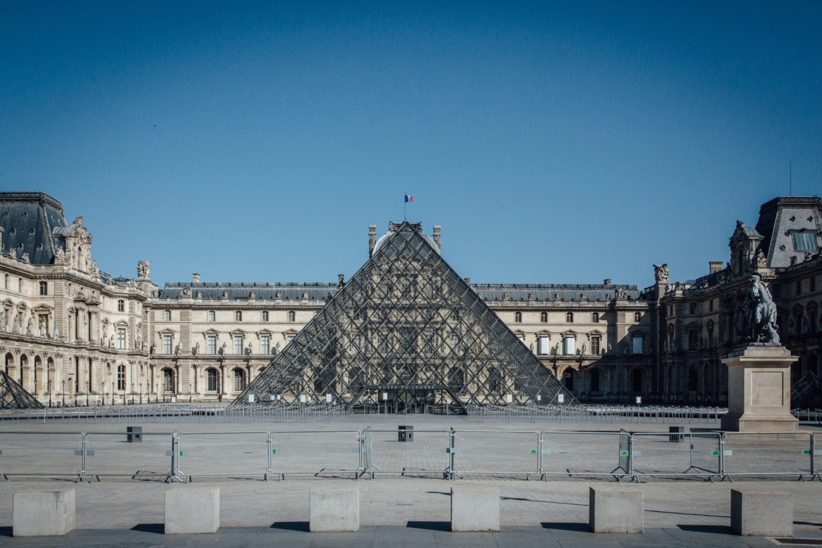 Barriers block access to the Louvre museum during coronavirus lockdown measures in Paris on April 14, 2020. A year ago, Louis Vuitton's Nicolas Ghesquiere set up his catwalk inside the Louvre, a monumental show that fashion filmmaker Loic Prigent described as "a swan song to covid-free times." MUST CREDIT: Bloomberg photo by Cyril Marcilhacy