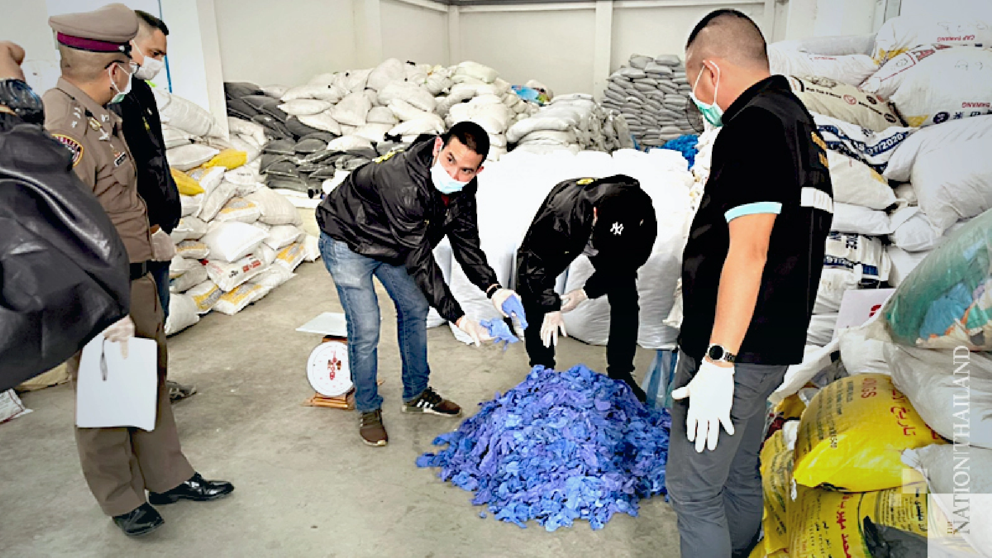 Crackdown on business recycling used rubber gloves