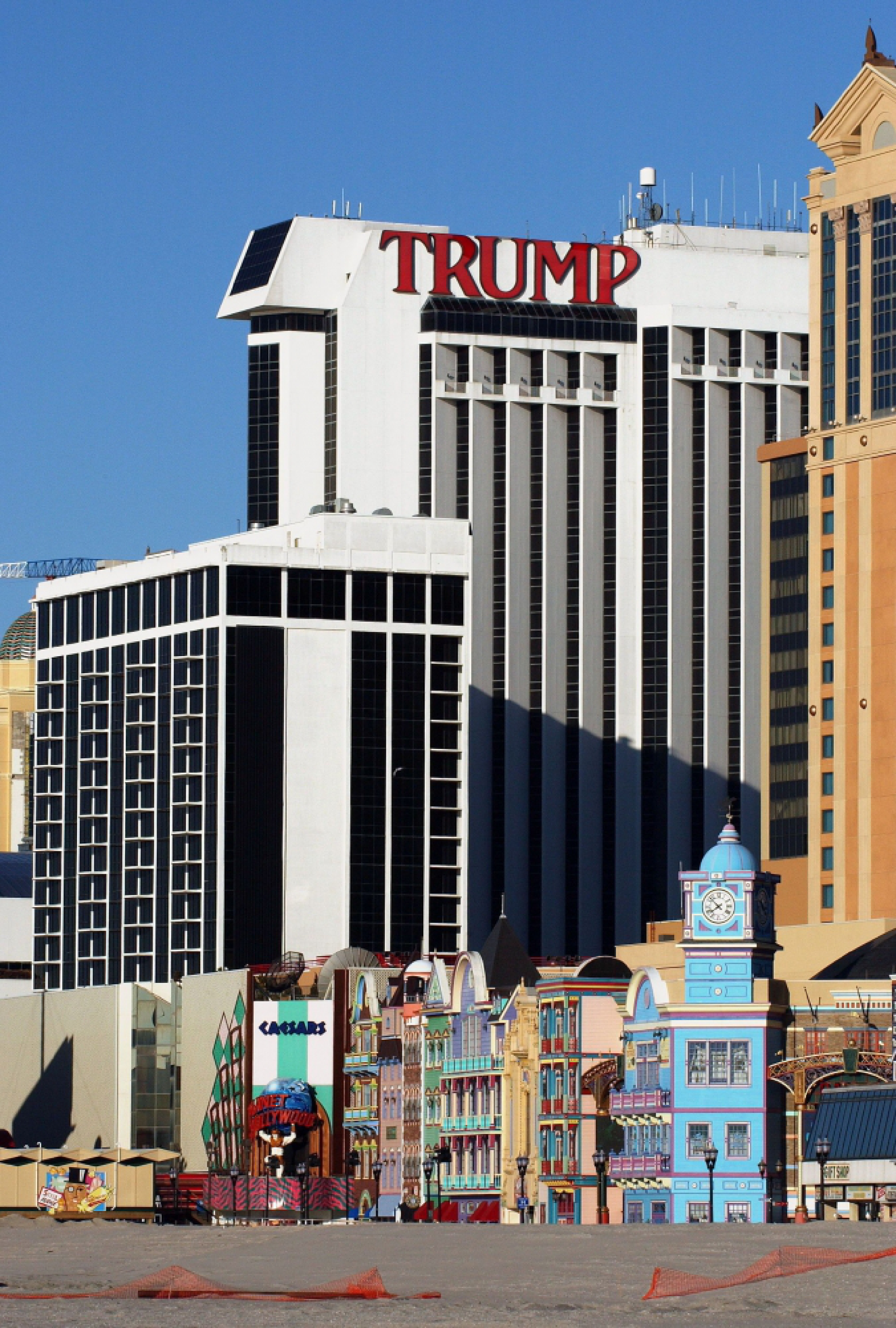 The Trump Plaza casino looms above the colorful facade of the Bally's Casino in Atlantic City, N.J., on Feb. 28, 2004. MUST CREDIT: Bloomberg photo by Emile Wamsteker