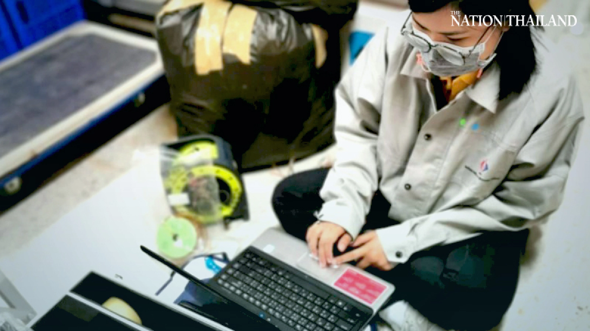 Specialists check to see if warehouse cool enough to store vaccine