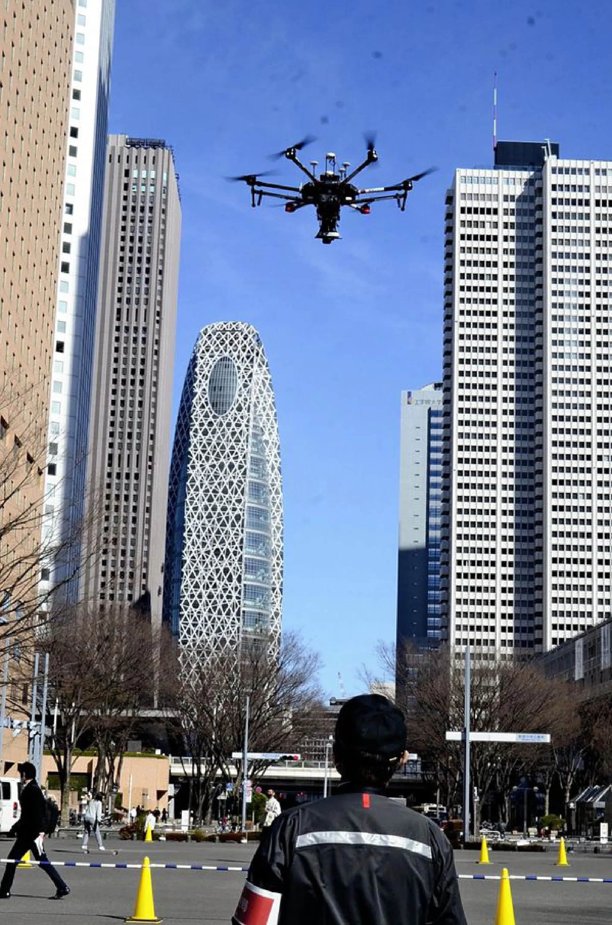 A drone flies near the Tokyo Metropolitan Government Office in Shinjuku Ward on Wednesday.