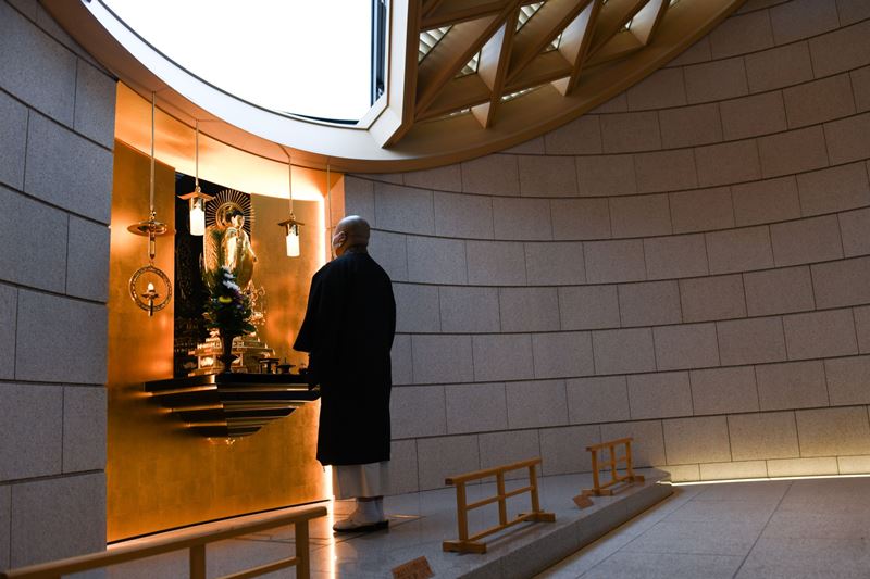 A priest offers a prayer at Tsukiji Hongwanji temple in Tokyo. MUST CREDIT: Bloomberg photo by Noriko Hayashi