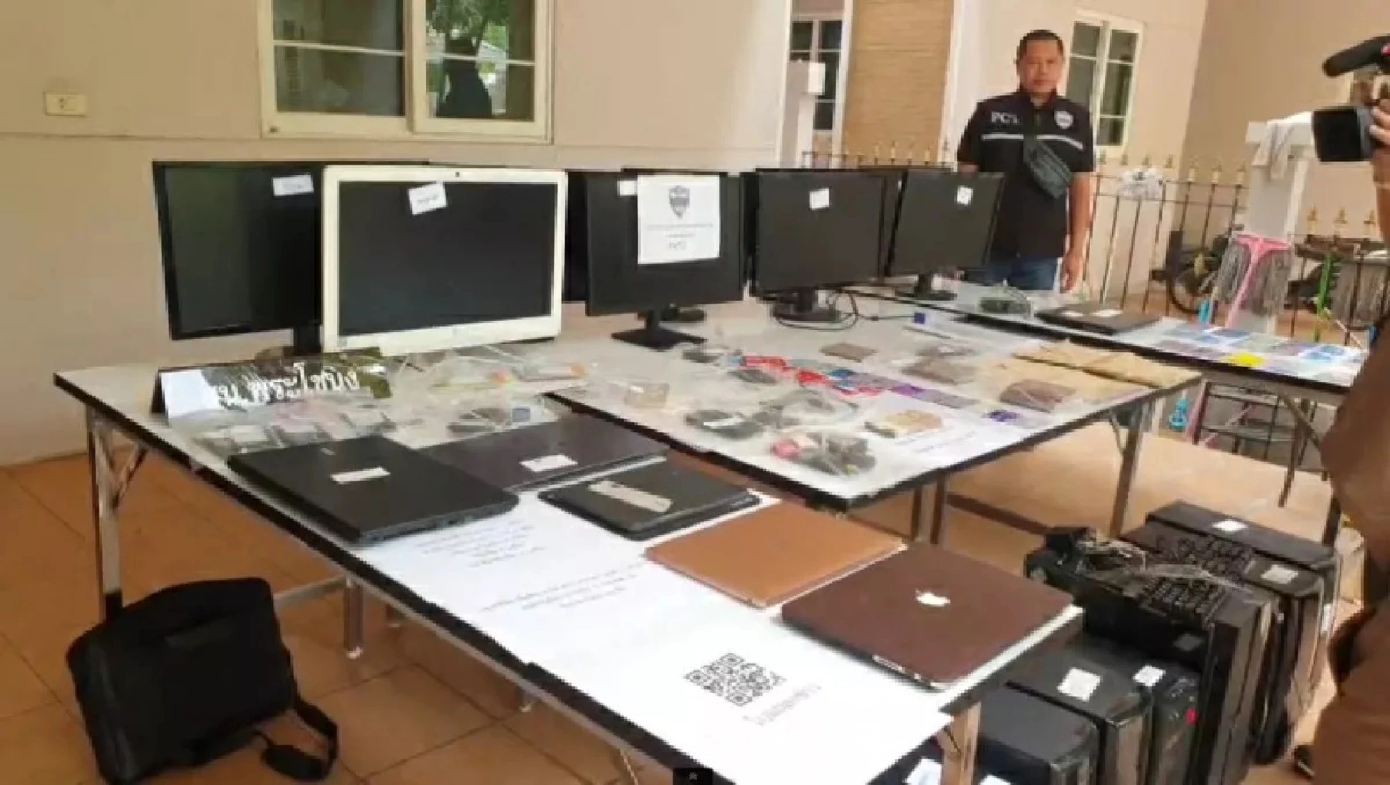 Police arrest 12 in raid on online gambling business