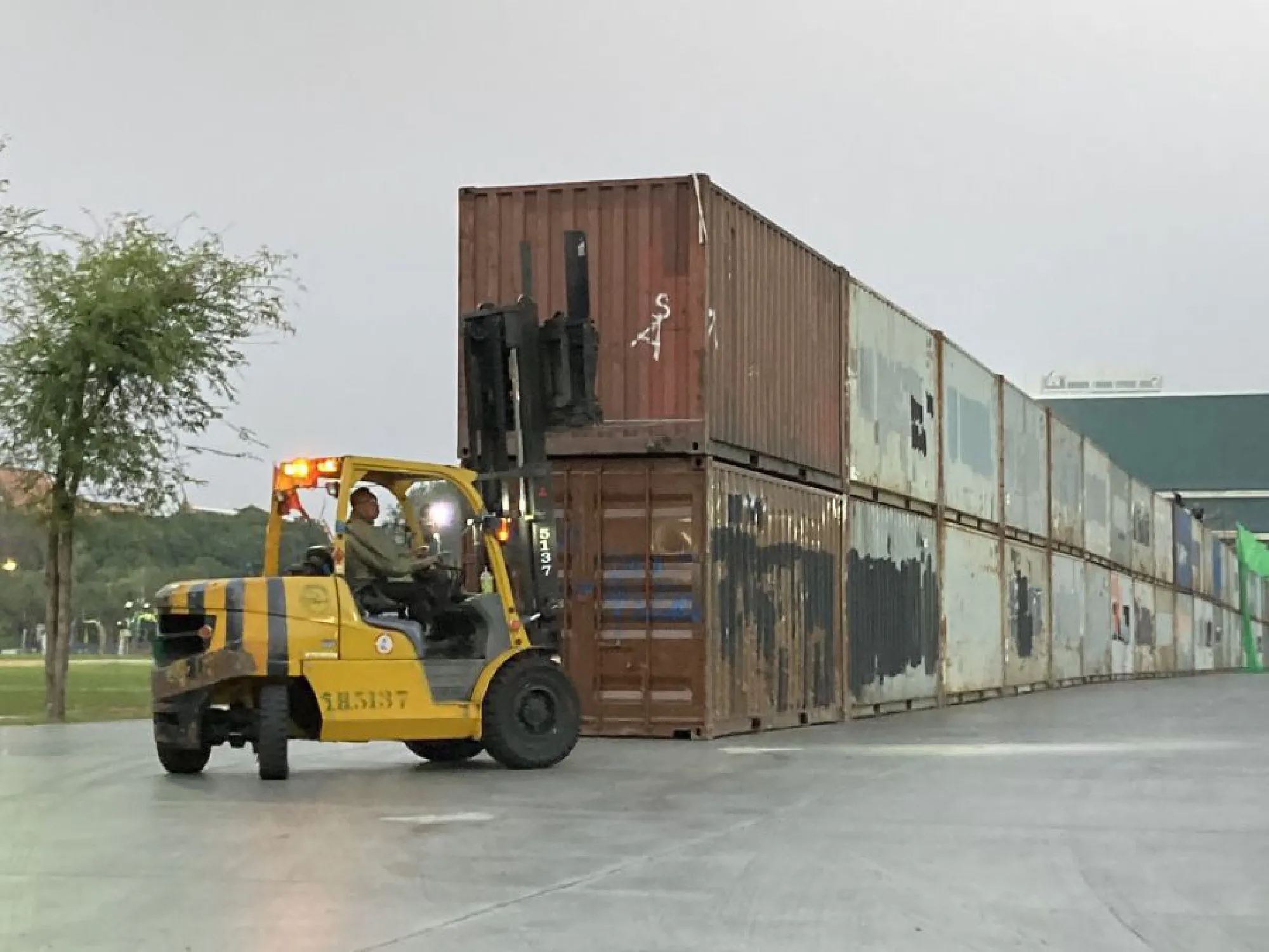 Container wall built around Sanam Luang in anticipation of pro-democracy protests