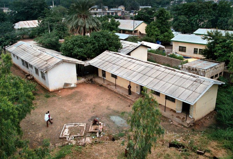 An ill man is carried into the Infectious Diseases Hospital in Kano, Nigeria, in 2000. MUST CREDIT: Washington Post photo by Michael S. Williamson
