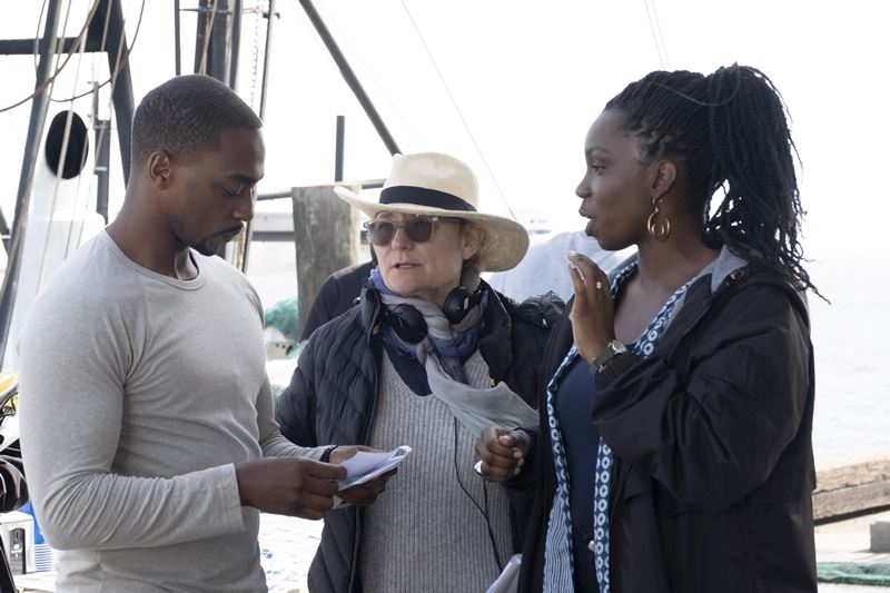 Anthony Mackie, left, director Kari Skogland and Adepero Oduye, who plays Sarah Wilson, Sam's sister, on the set of "The Falcon and the Winter Soldier." MUST CREDIT: Marvel Studios/Disney Plus.