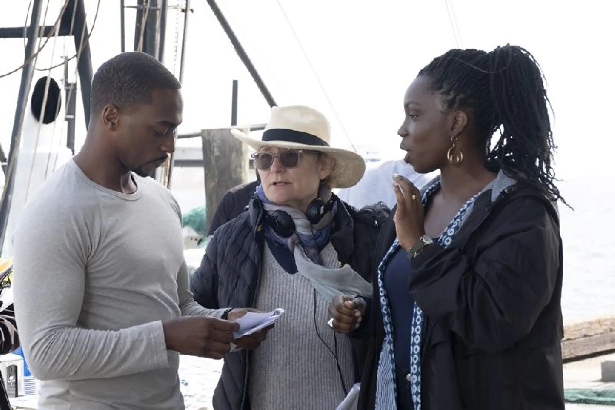 Anthony Mackie, left, director Kari Skogland and Adepero Oduye, who plays Sarah Wilson, Sam's sister, on the set of "The Falcon and the Winter Soldier." MUST CREDIT: Marvel Studios/Disney Plus.