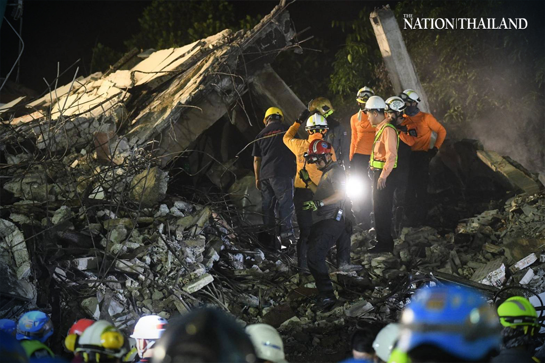 Dead bodies of firefighters pulled out of building debris