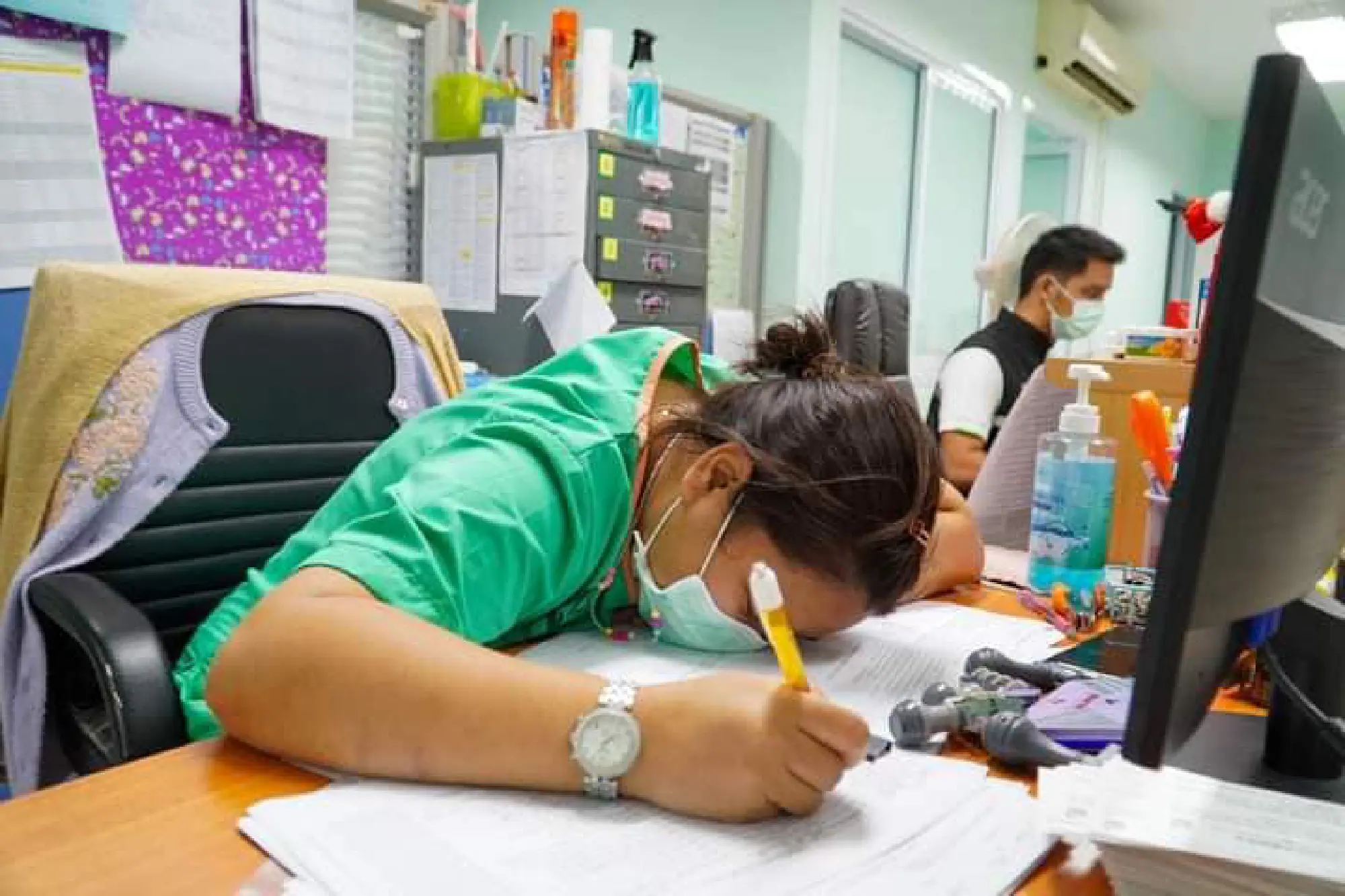 Photos of exhausted medical professionals, staff go viral, receive overwhelming support