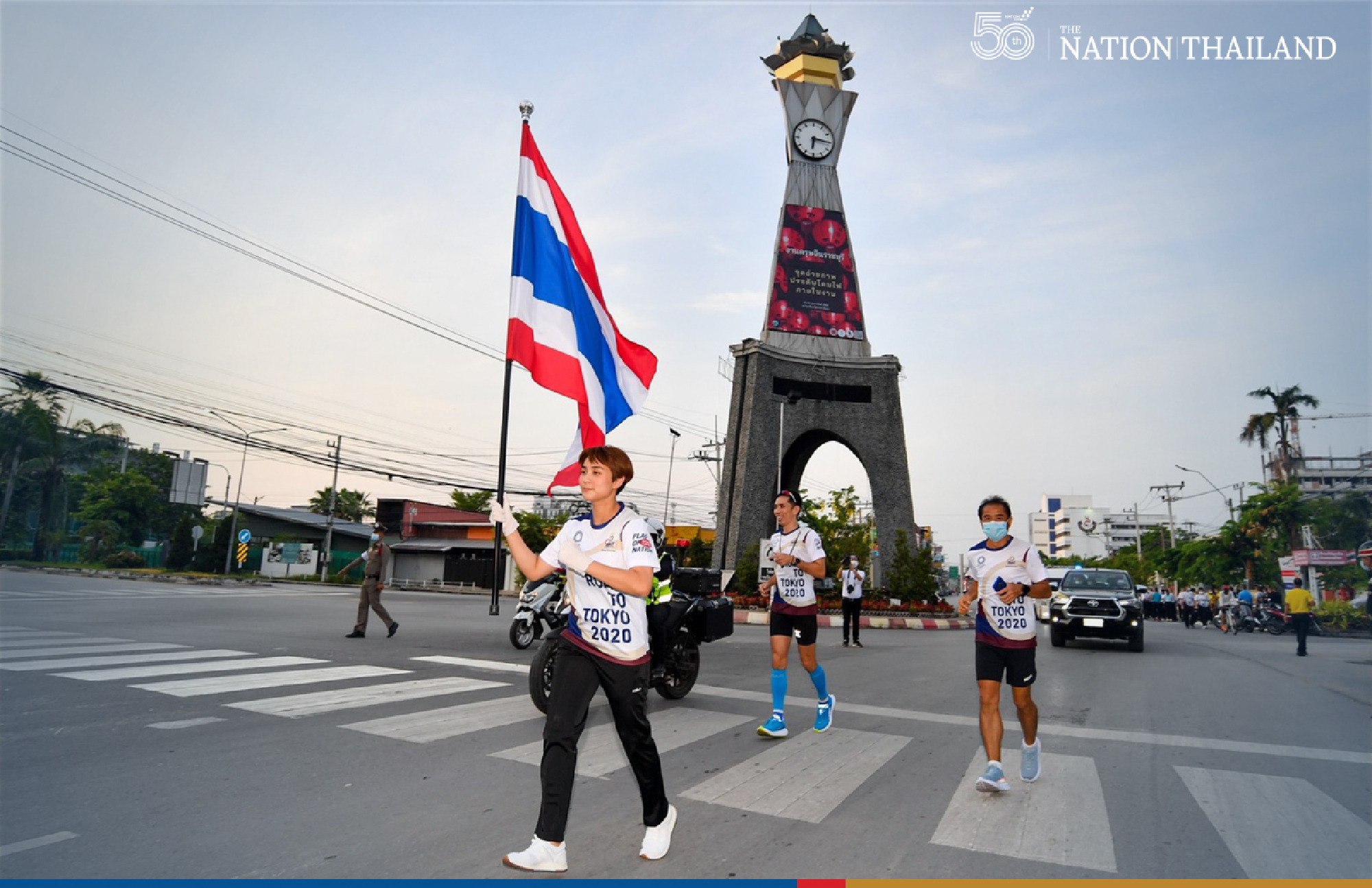 Two former Olympic athletes, Yaowapa Boorapolchai and Manus Boonjumnong, joined the “Flag of Nation” relay on Thursday as the nationwide run reached its 26th day.