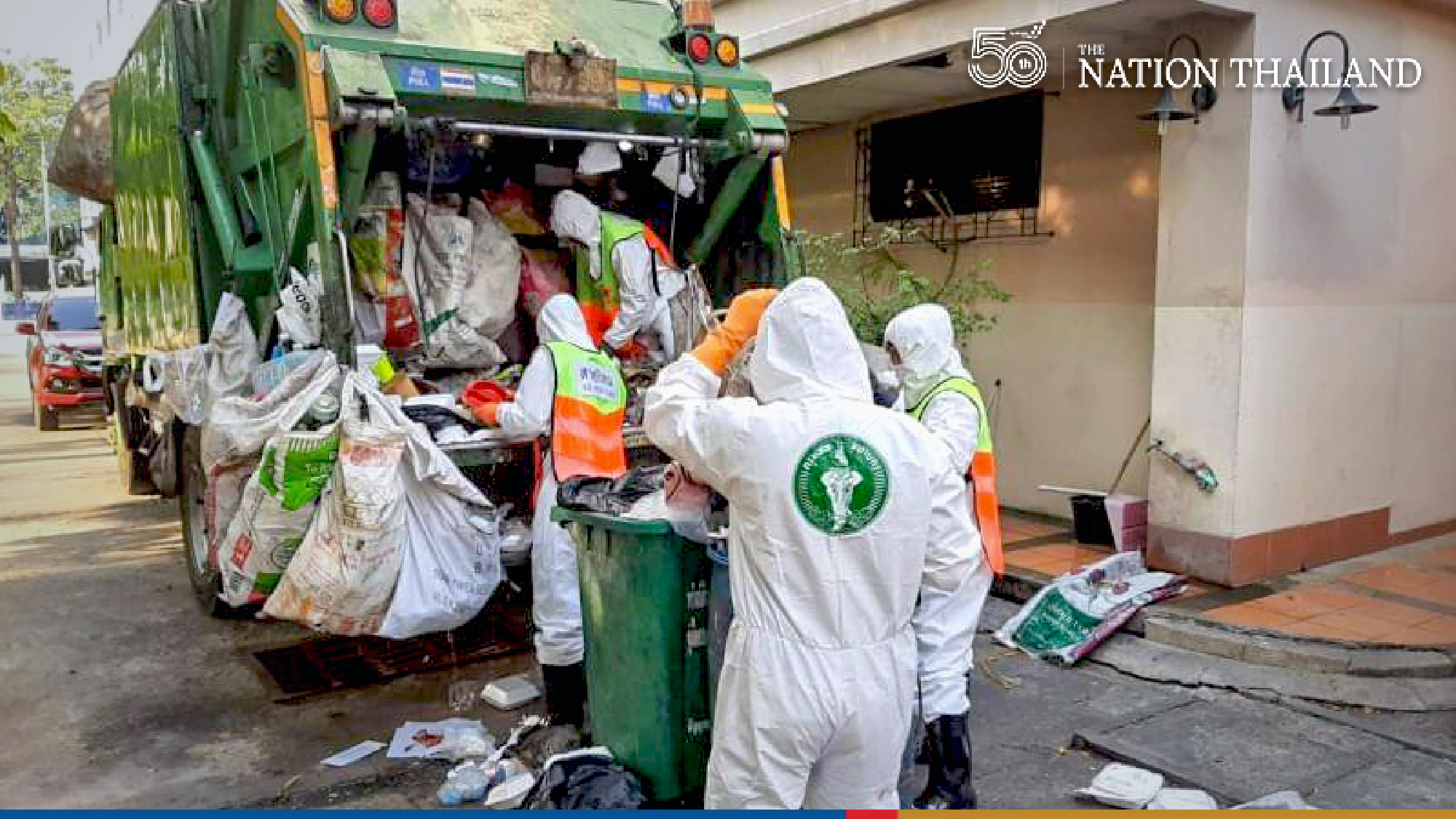Orange bins mushroom in Bangkok as 3rd wave brings tide of used masks