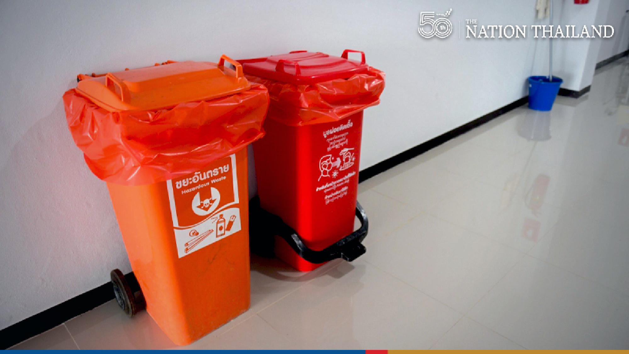 Orange bins mushroom in Bangkok as 3rd wave brings tide of used masks
