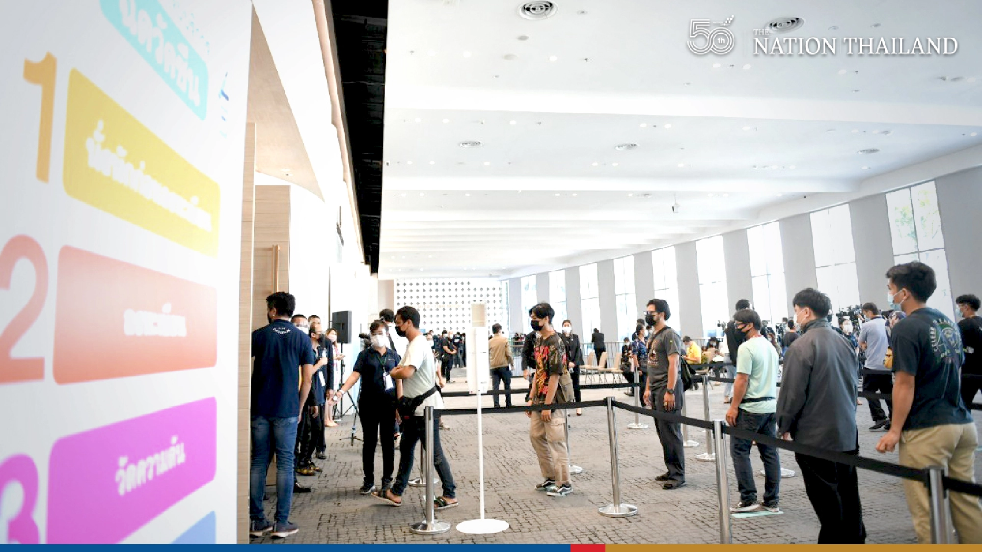 PM checks two more shop-and-jab stations in Bangkok malls