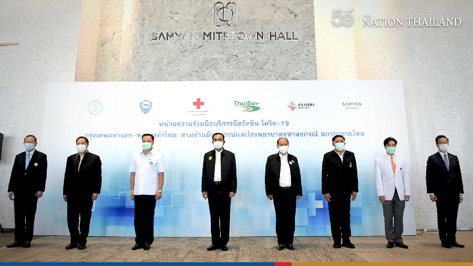 PM checks two more shop-and-jab stations in Bangkok malls