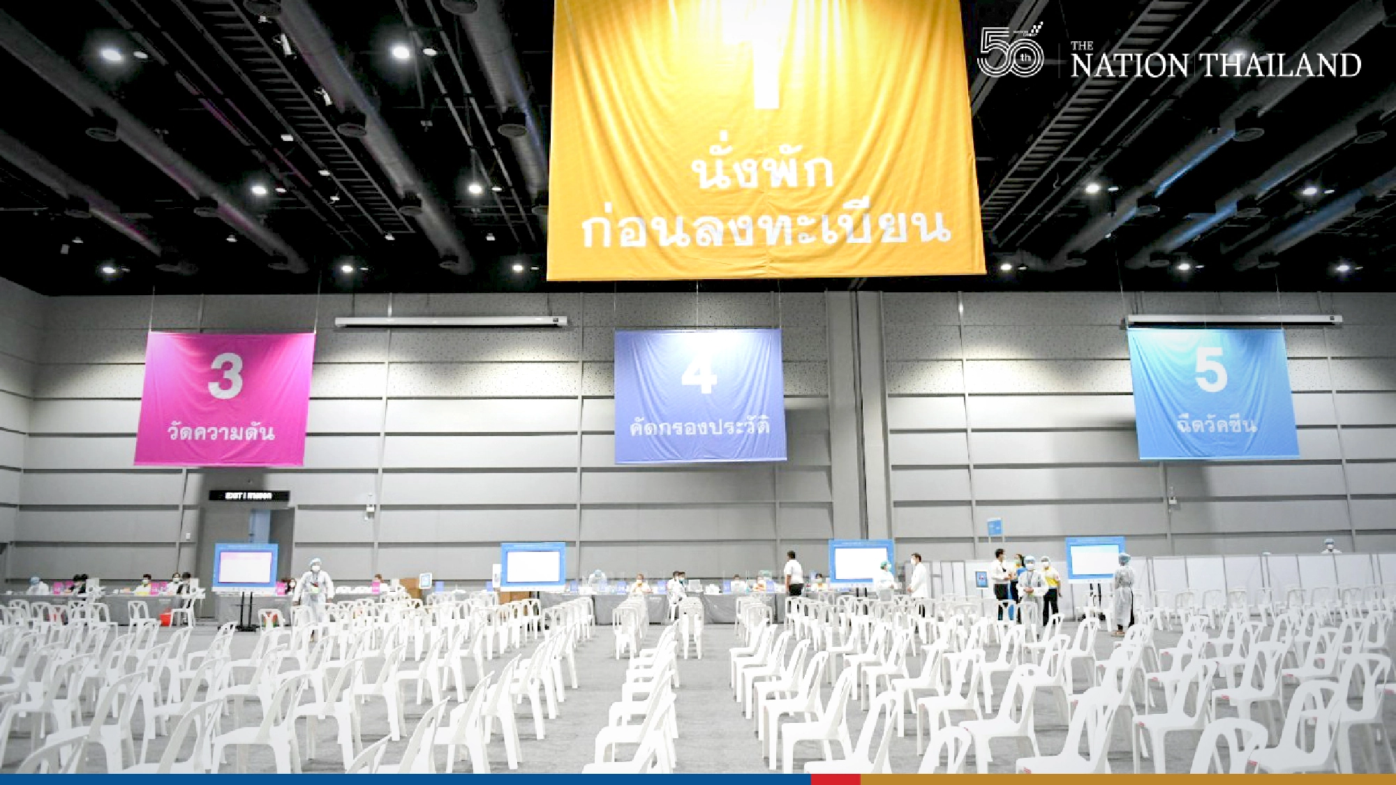 PM checks two more shop-and-jab stations in Bangkok malls