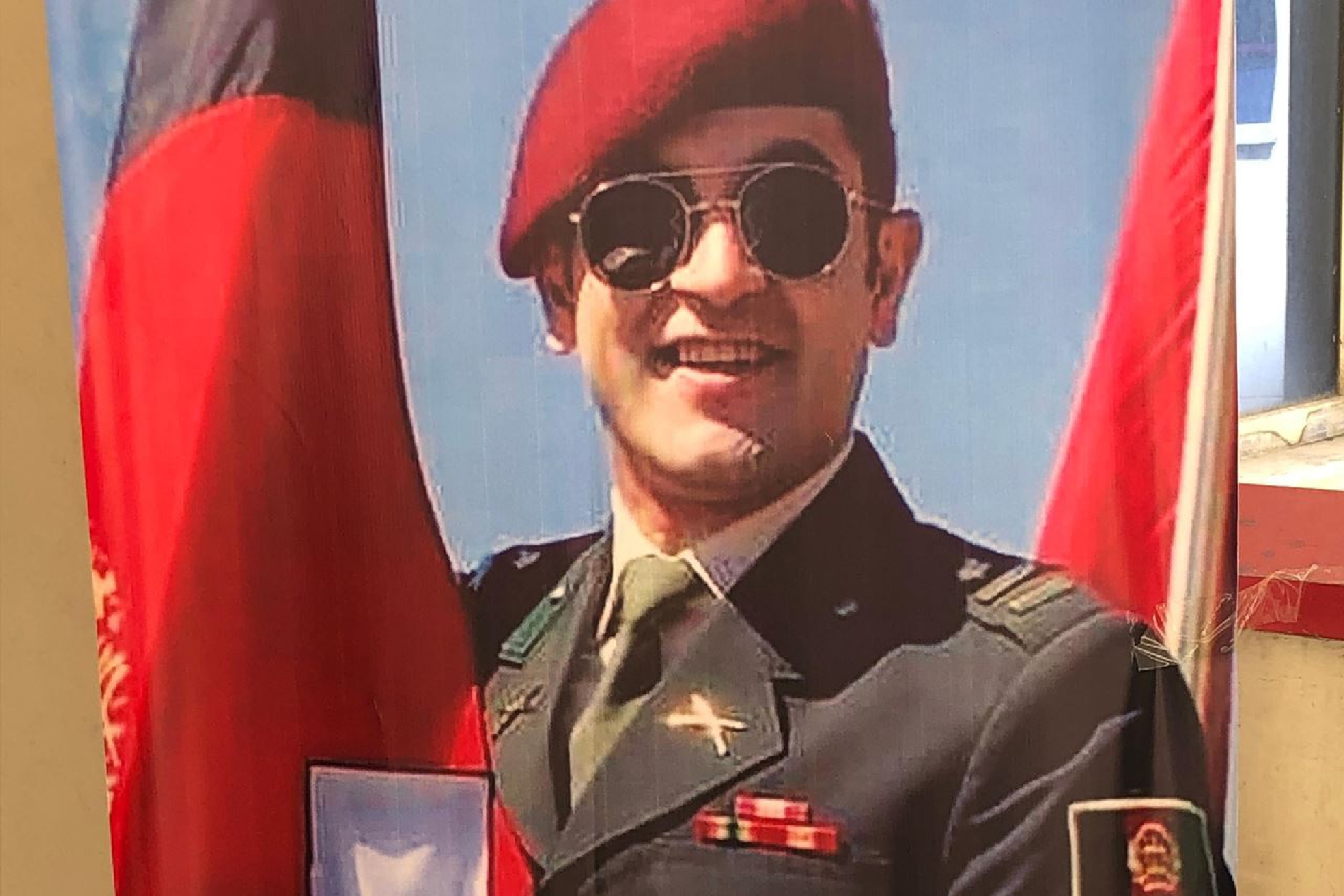 A poster showing an image of the late Afghan commando leader, Col. Sohrab Azimi, 31, in Kabul on June 18. MUST CREDIT: Washington Post photo by Pamela Constable.