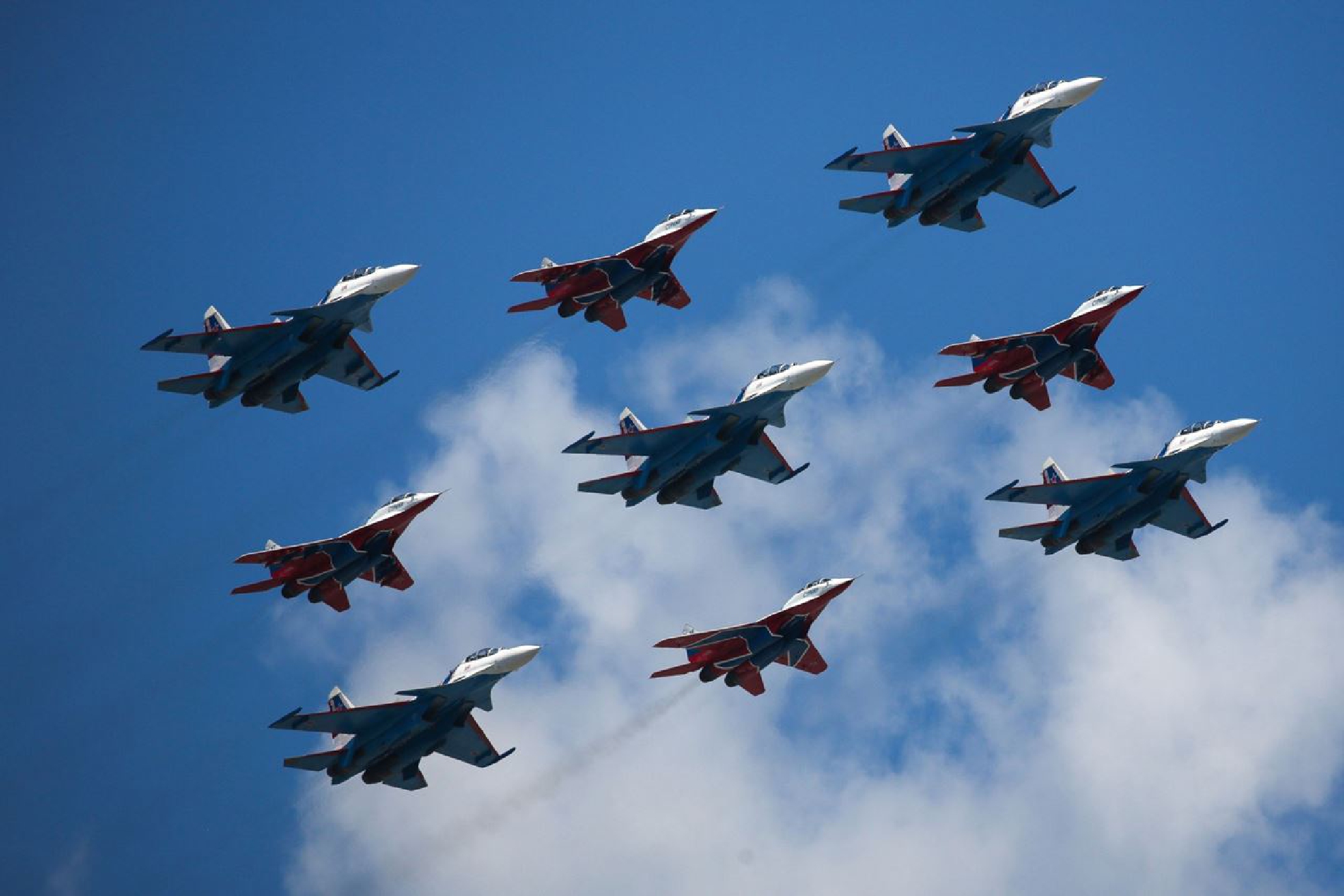The Russian Knights and Strizhi aerobatic units fly Sukhoi Su-30SM and Mikoyan MiG-29 fighter jets during the victory day parade in Moscow on June 24, 2020. MUST CREDIT: Bloomberg photo by Andrey Rudakov.