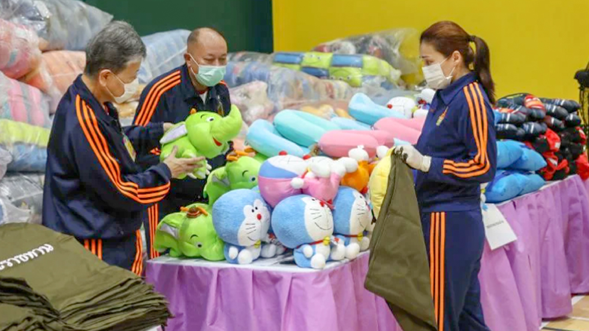 Their Majesties present support bags to hospital staff to mark Queens birthday