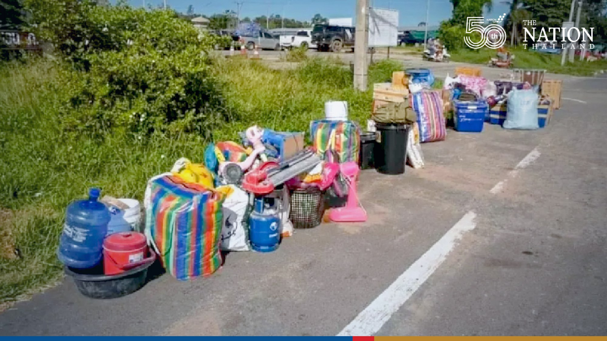 Cambodian workers head for the exit as construction camps close from today