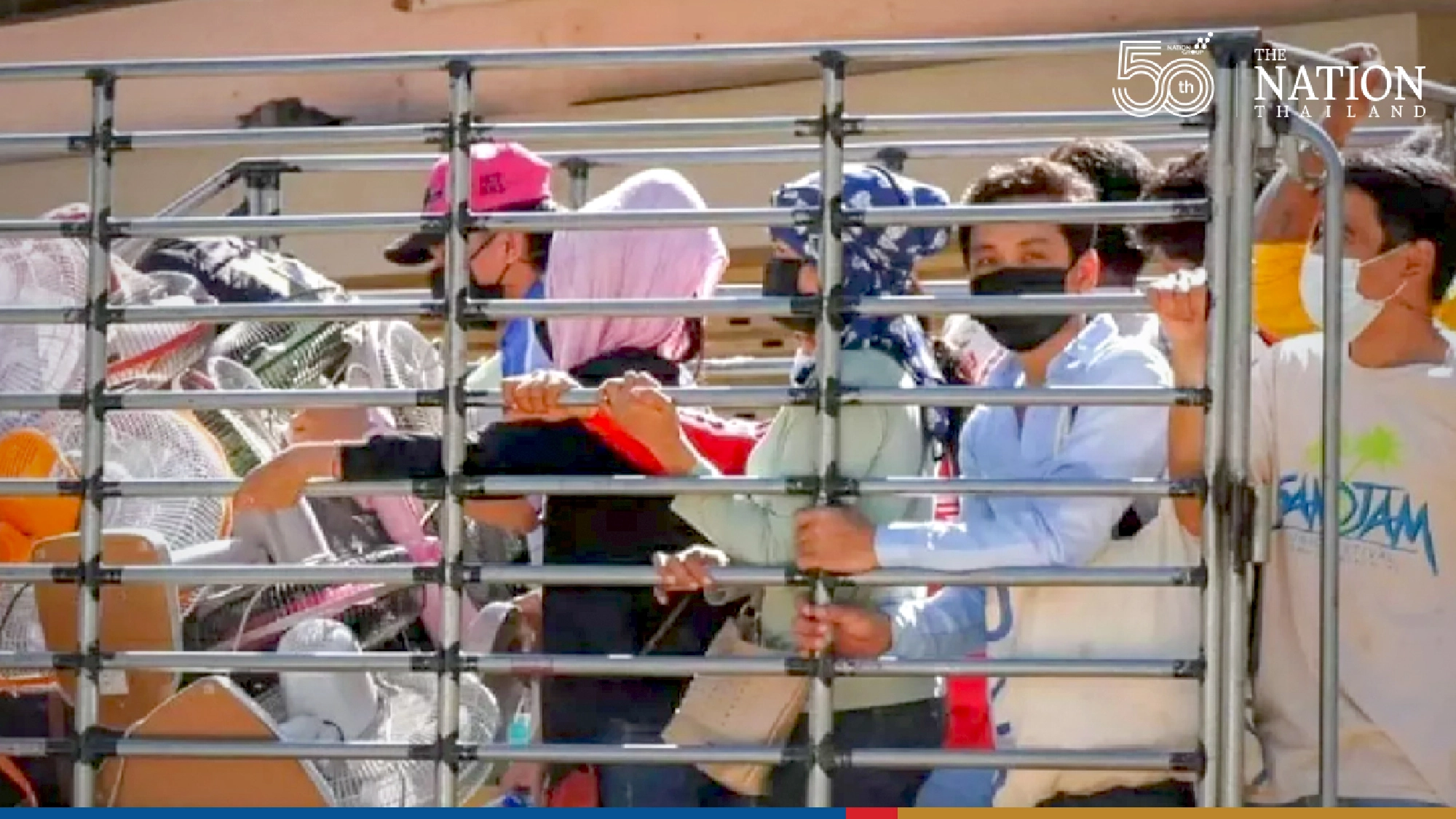 Cambodian workers head for the exit as construction camps close from today