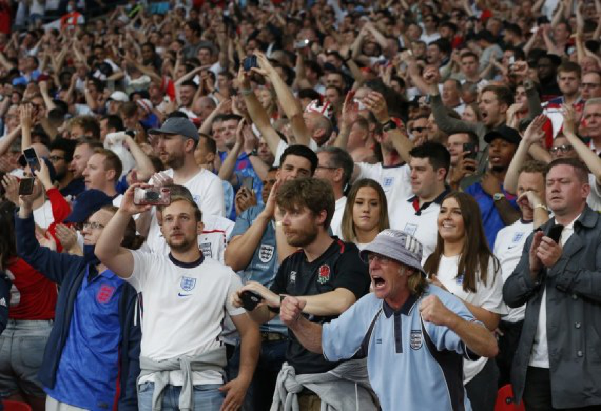 Fans of England are seen during the final between England and Italy at the UEFA EURO 2020 in London, Britain