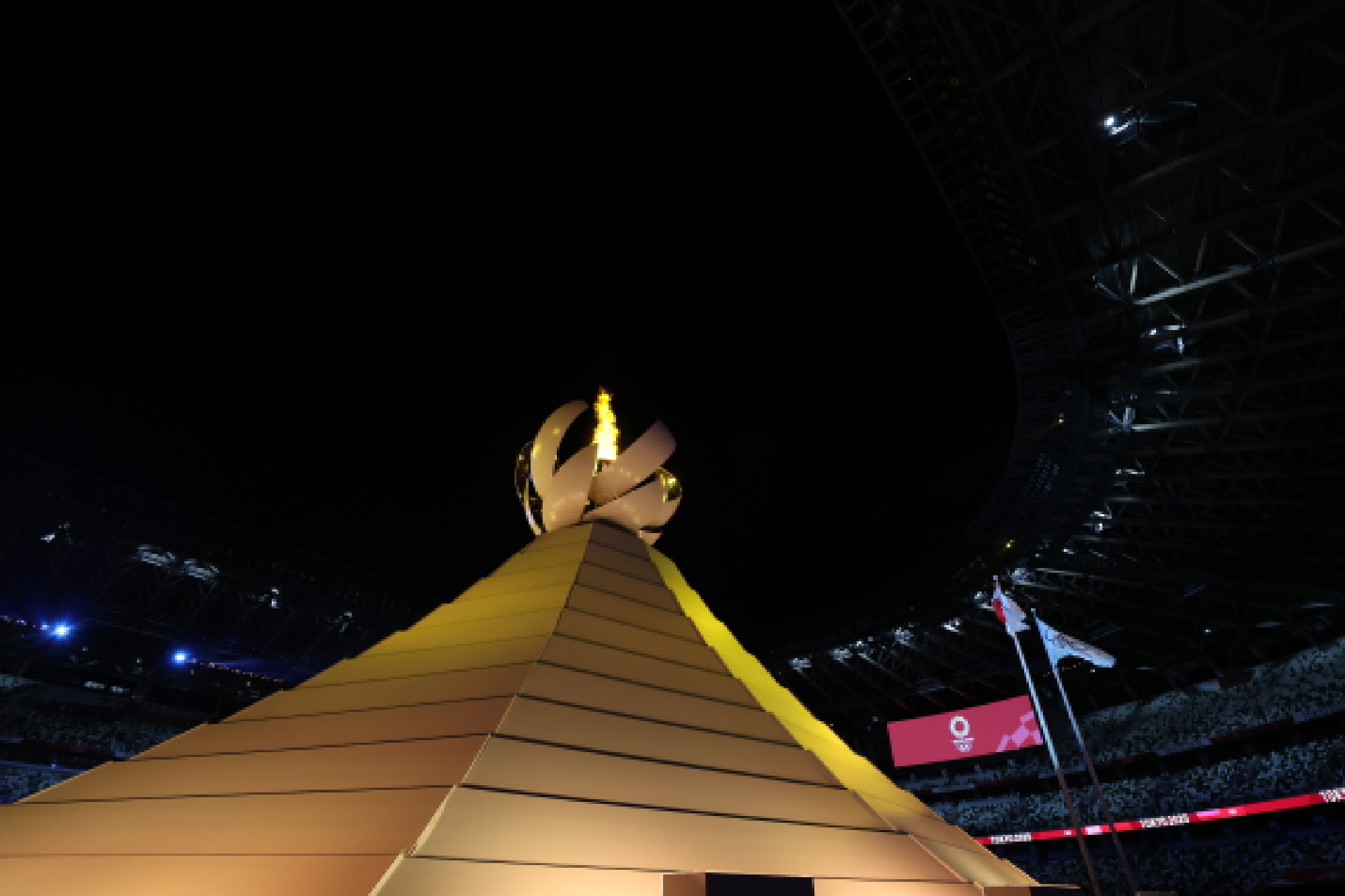 The cauldron is lit during the opening ceremony of Tokyo 2020 