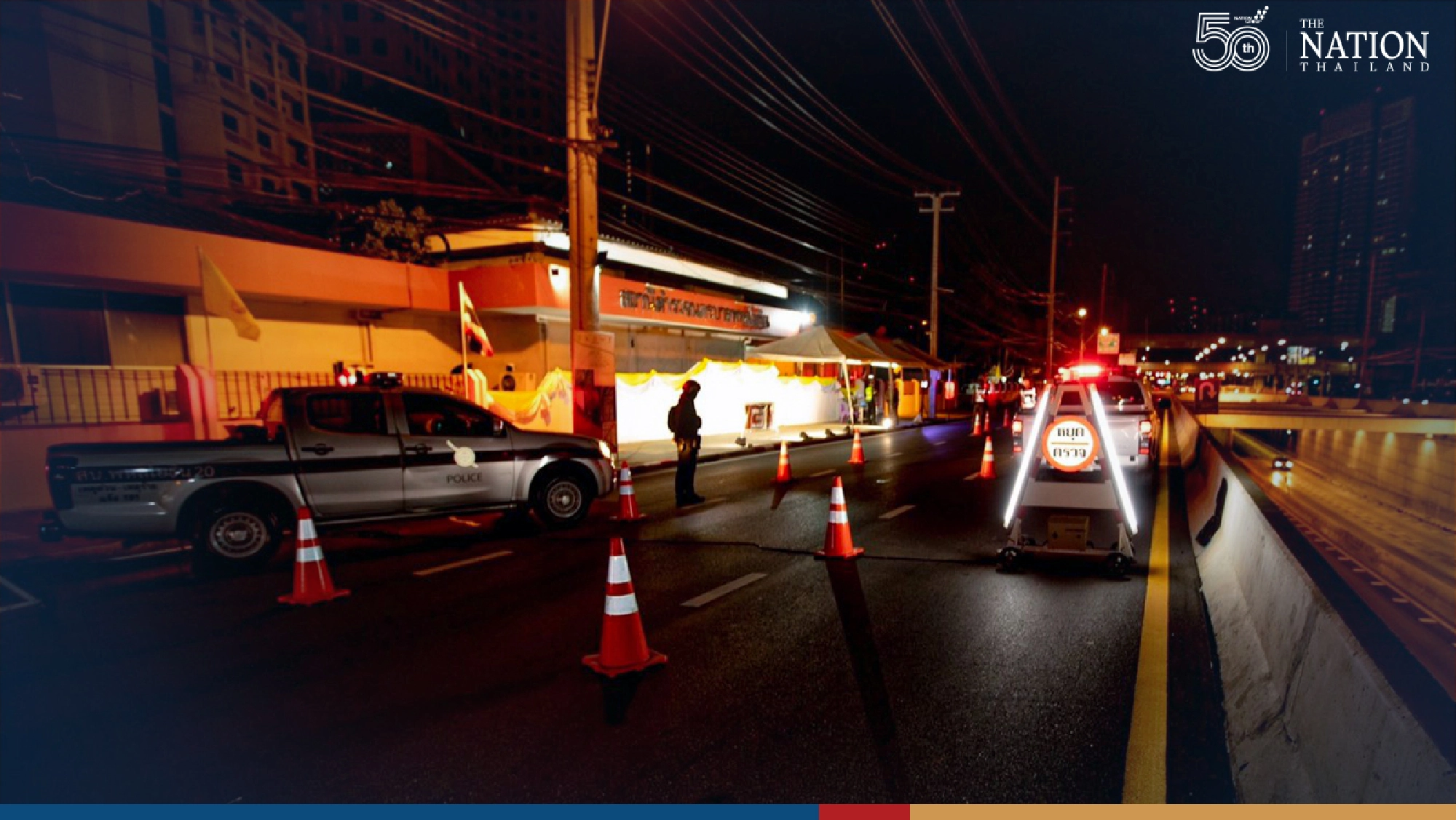 Police set up checkpoints as night curfew begins in Bangkok