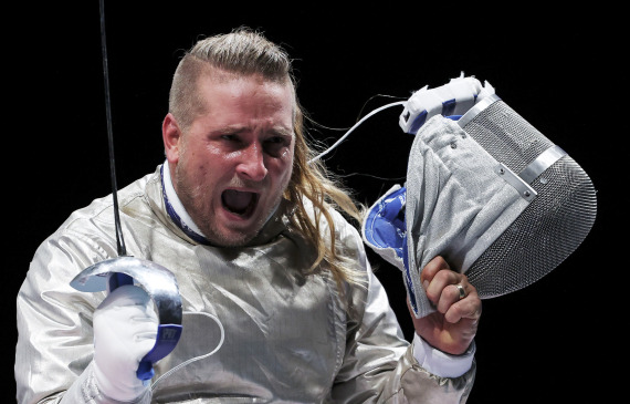 Tamas Decsi of Hungary celebrates during the fencing men's sabre team semifinal between Hungary and Italy at the Tokyo 2020 Olympic Games in Chiba, Japan, on July 28, 2021.