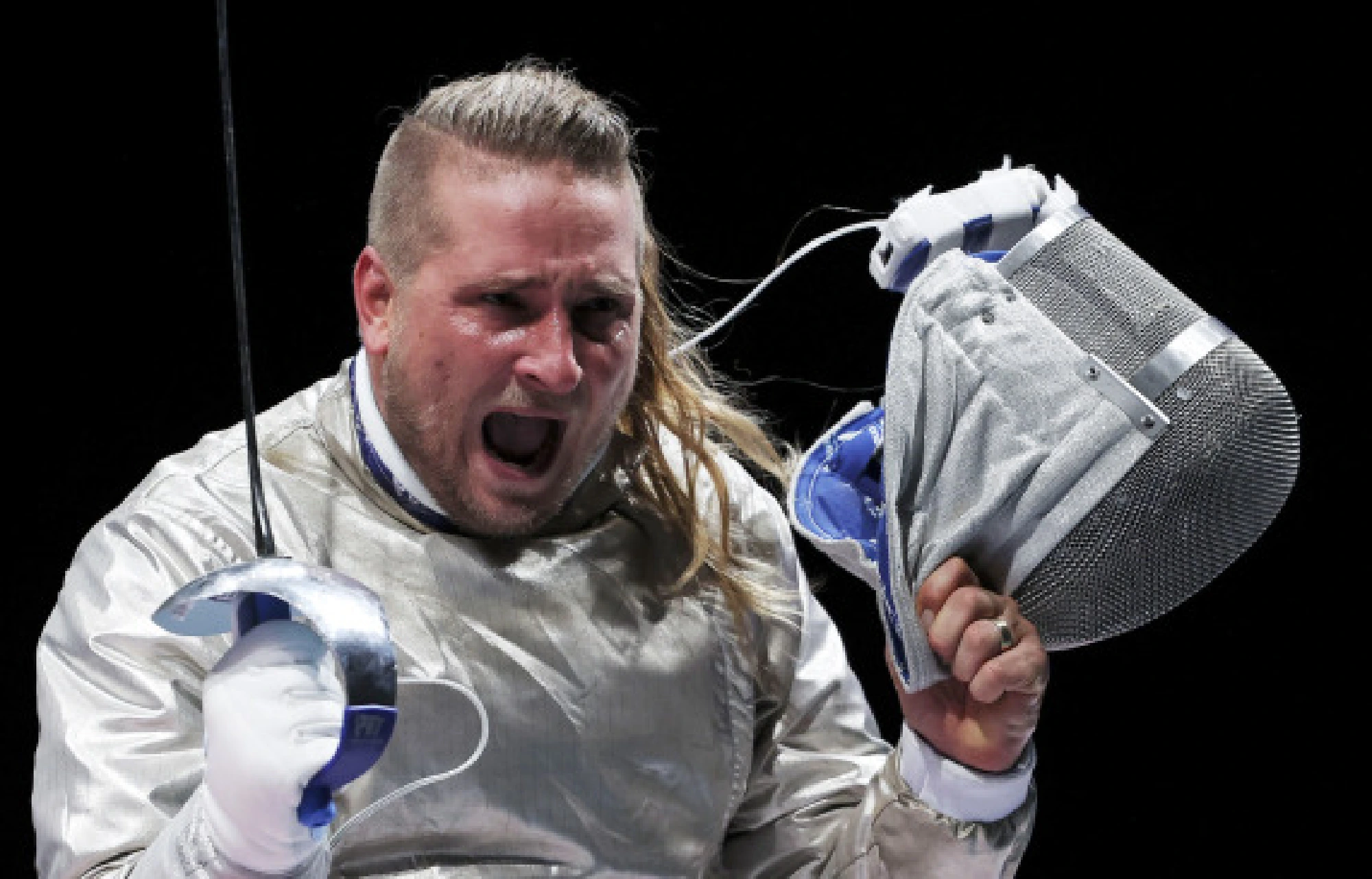 Tamas Decsi of Hungary celebrates during the fencing men's sabre team semifinal between Hungary and Italy at the Tokyo 2020 Olympic Games in Chiba, Japan, on July 28, 2021.