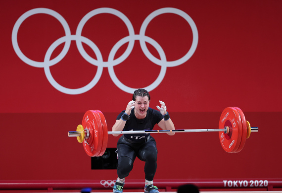Glorgia Bordignon of Italy reacts during the weightlifting women's 64kg group A match at the Tokyo 2020 Olympic Games in Tokyo, Japan, July 27, 2021.
