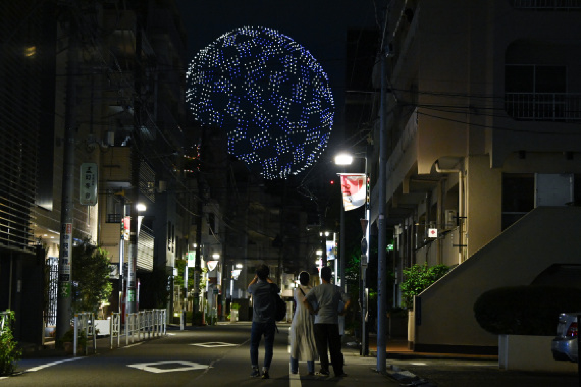 A fleet of drones form the Tokyo 2020 emblem over the Olympic Stadium during the opening ceremony of the Tokyo 2020 Olympic Games in Tokyo, Japan, July 23, 2021.