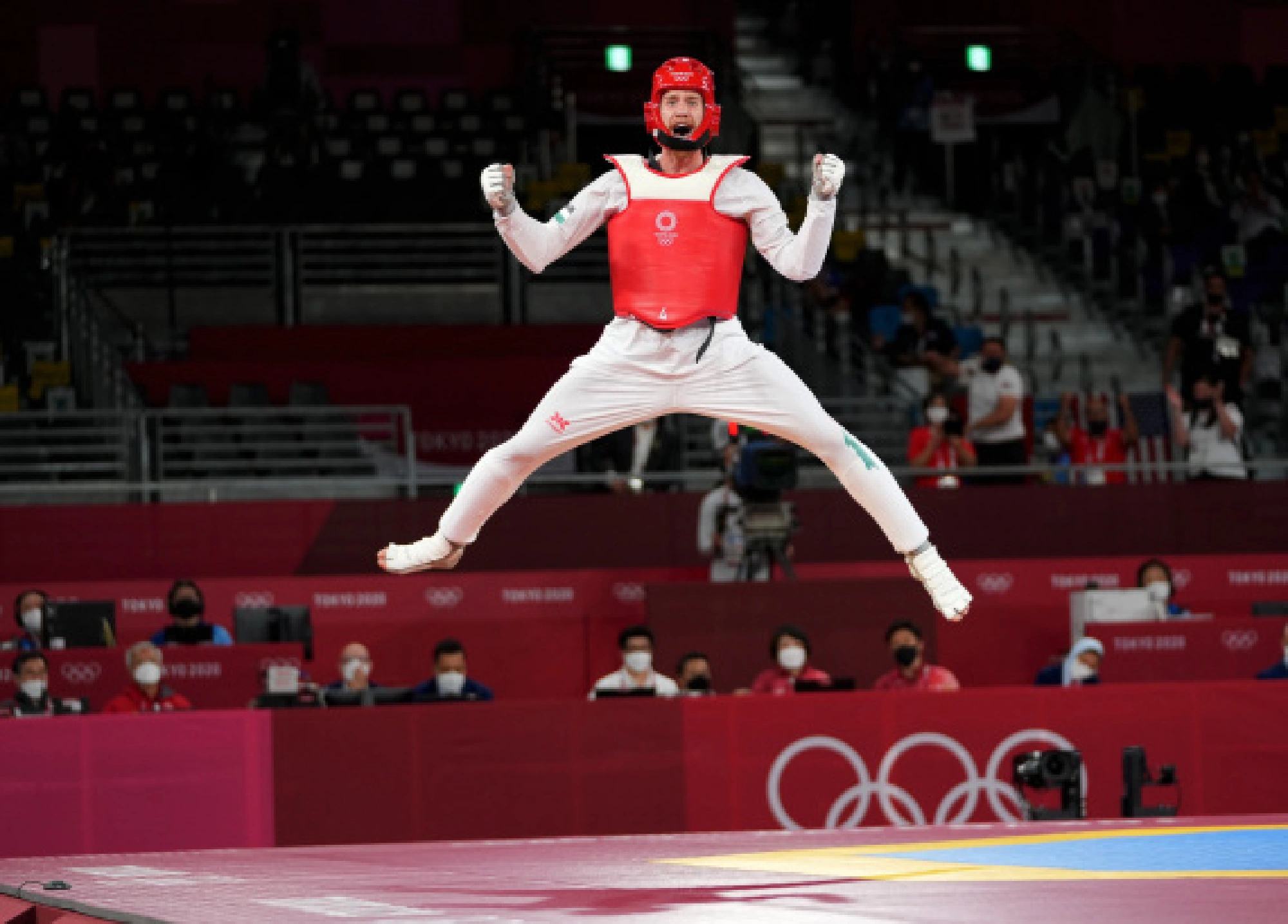 Saleh Elsharabaty of Jordan celebrates after winning the men's 80kg semifinal taekwondo match between Saleh Elsharabaty of Jordan and Nikita Rafalovich of Uzbekistan at the Tokyo 2020 Olympic Games in Tokyo, Japan, July 26, 2021.