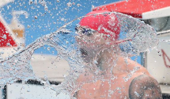 Adam Peaty of Great Britain celebrates after winning the men's 100m breaststroke final of swimming at Tokyo 2020 Olympic Games in Tokyo, Japan, July 26, 2021.