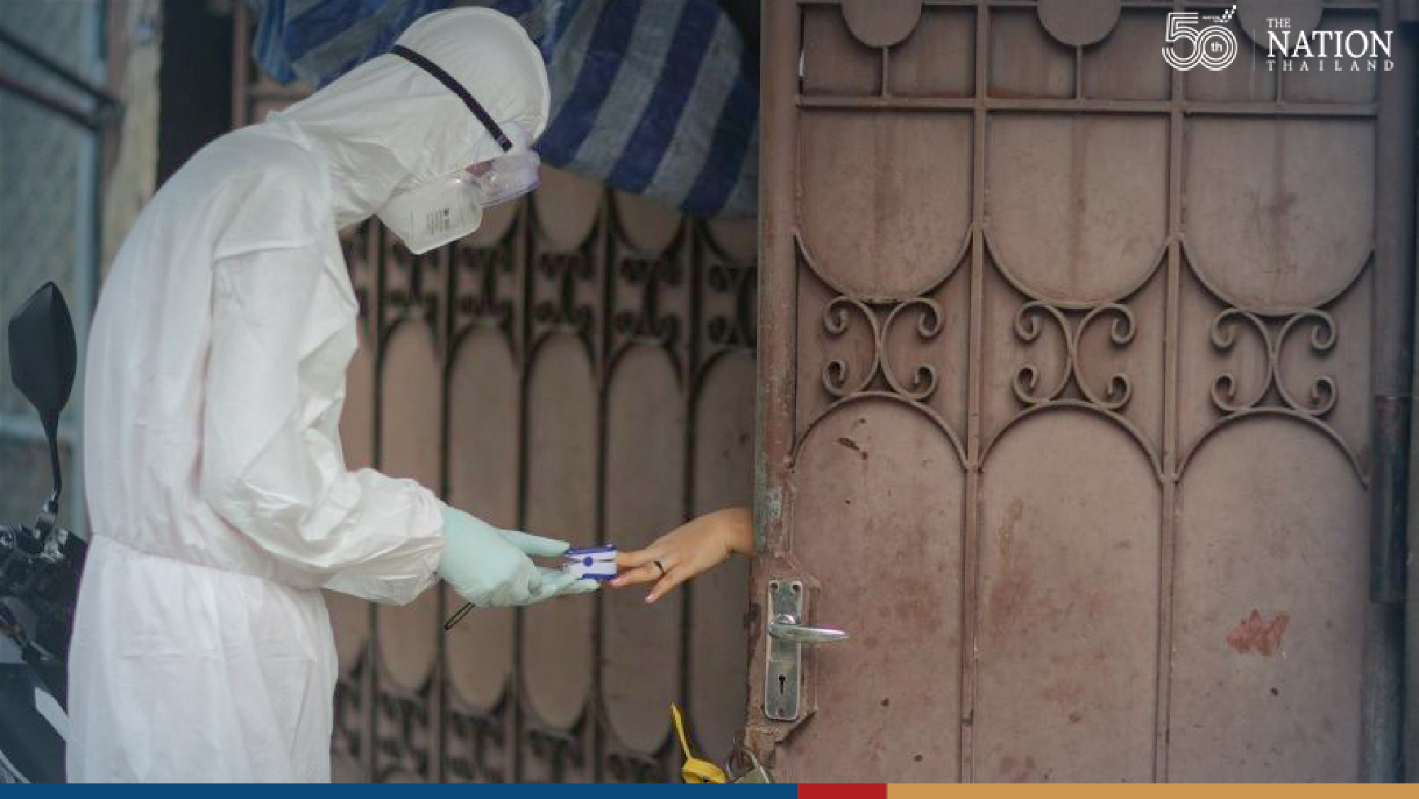 Monk on a mission: Bangkok monk dons PPE suit to tend to his flock