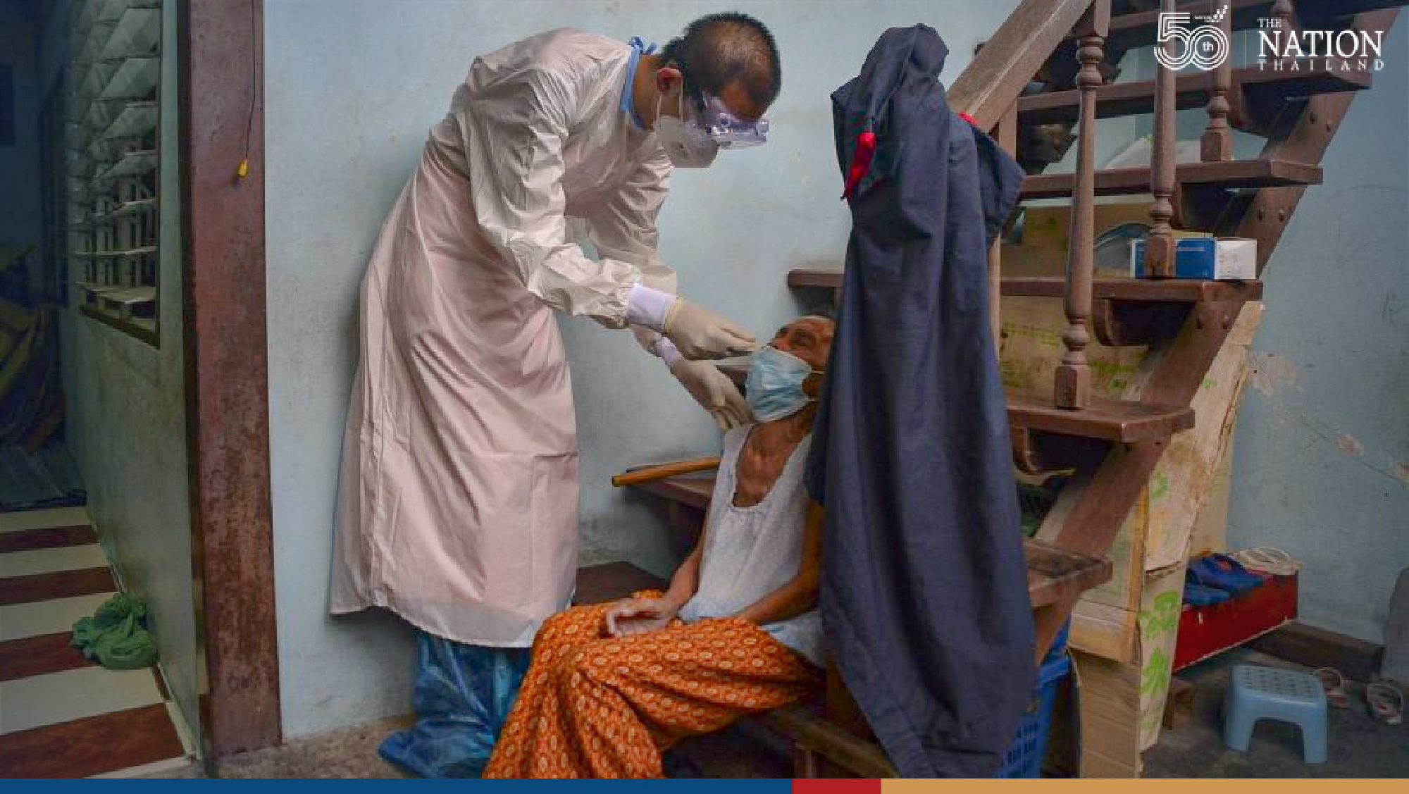 Monk on a mission: Bangkok monk dons PPE suit to tend to his flock