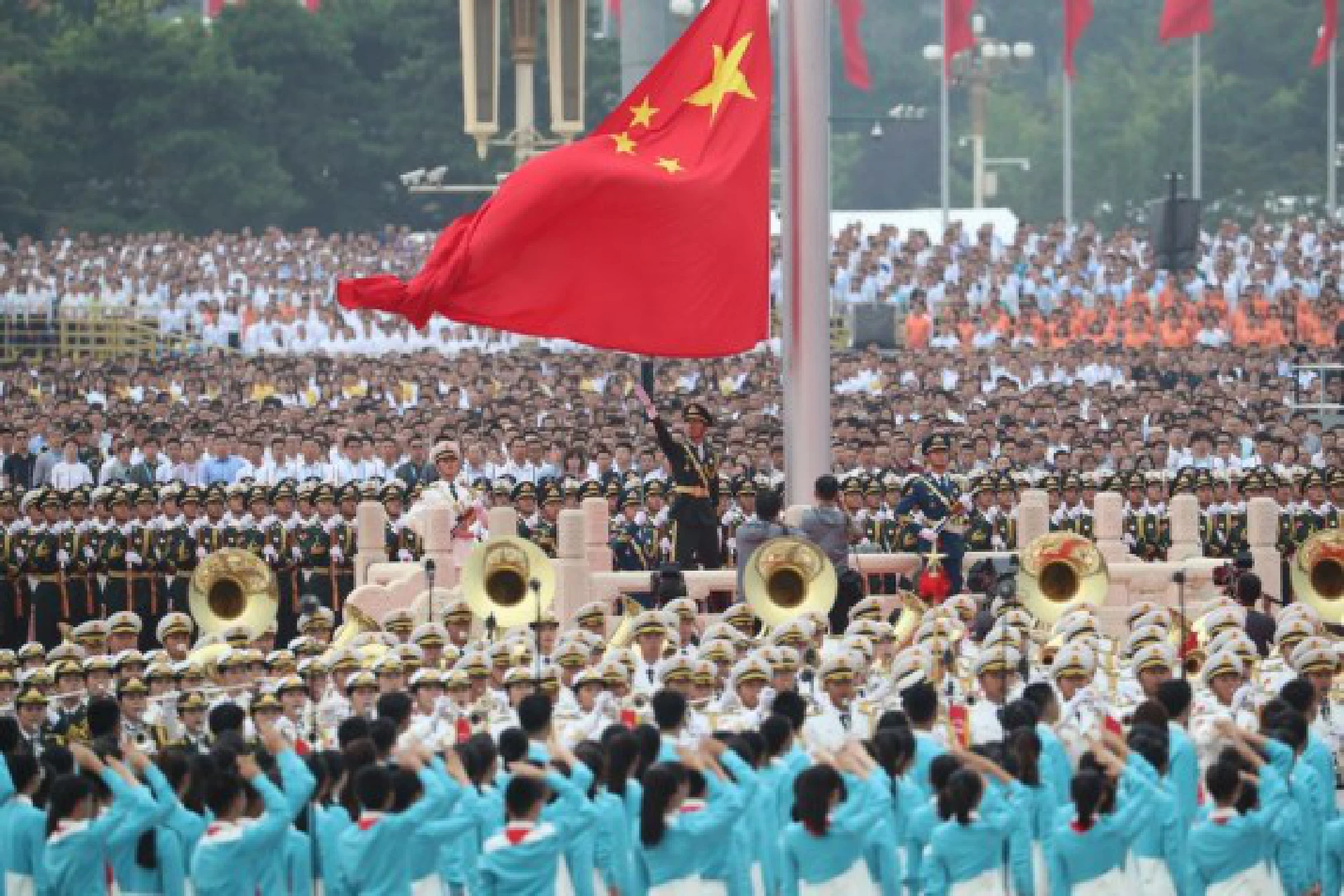 A national flag-raising ceremony is held at Tian'anmen Square during a ceremony marking the centenary of the Communist Party of China (CPC) in Beijing, capital of China, July 1, 2021