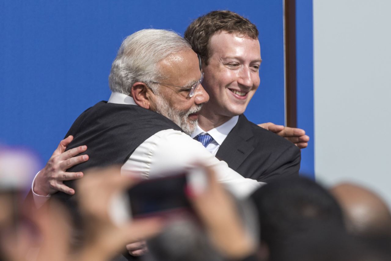 Narendra Modi, India's prime minister, left, and Mark Zuckerberg, chief executive officer of Facebook, embrace at the conclusion of a town hall meeting at Facebook headquarters in Menlo Park, Calif., on Sept. 27, 2015. MUST CREDIT: Bloomberg photo by David Paul Morris.