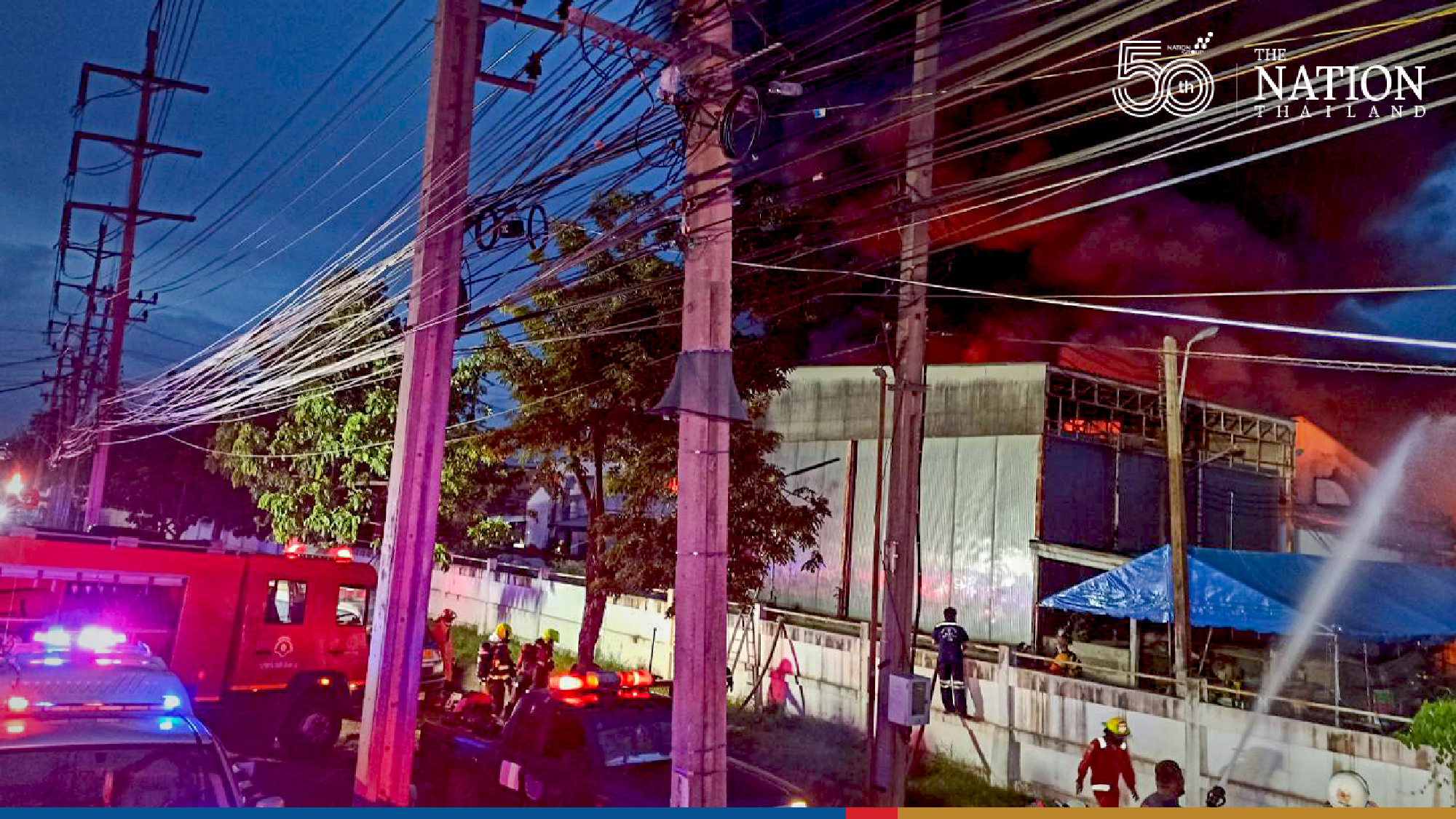 Firefighters busy again as blaze tears through Bangkok hotel supply factory