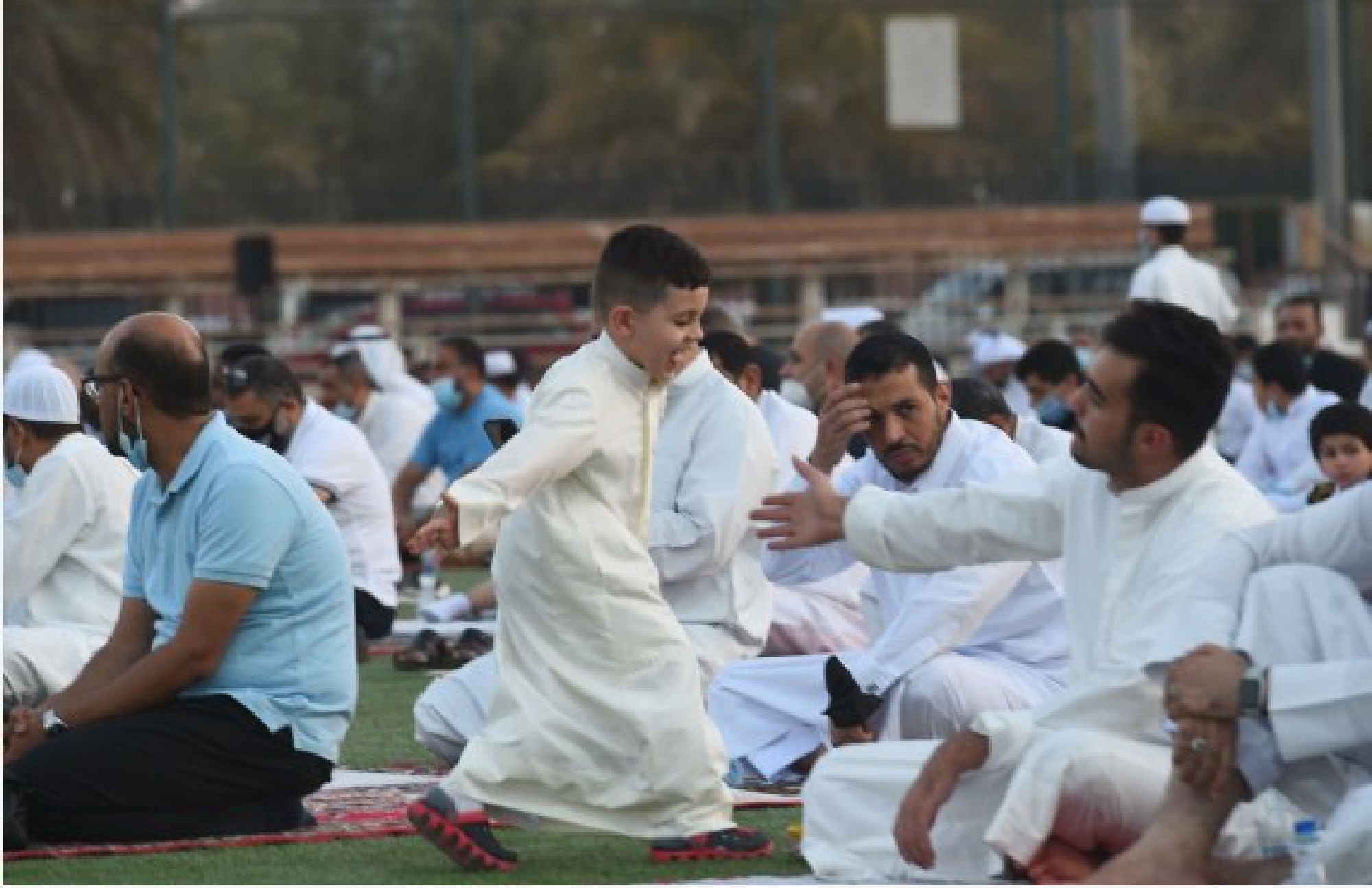 People perform prayers during Eid al-Adha holiday in Hawalli Governorate, Kuwait