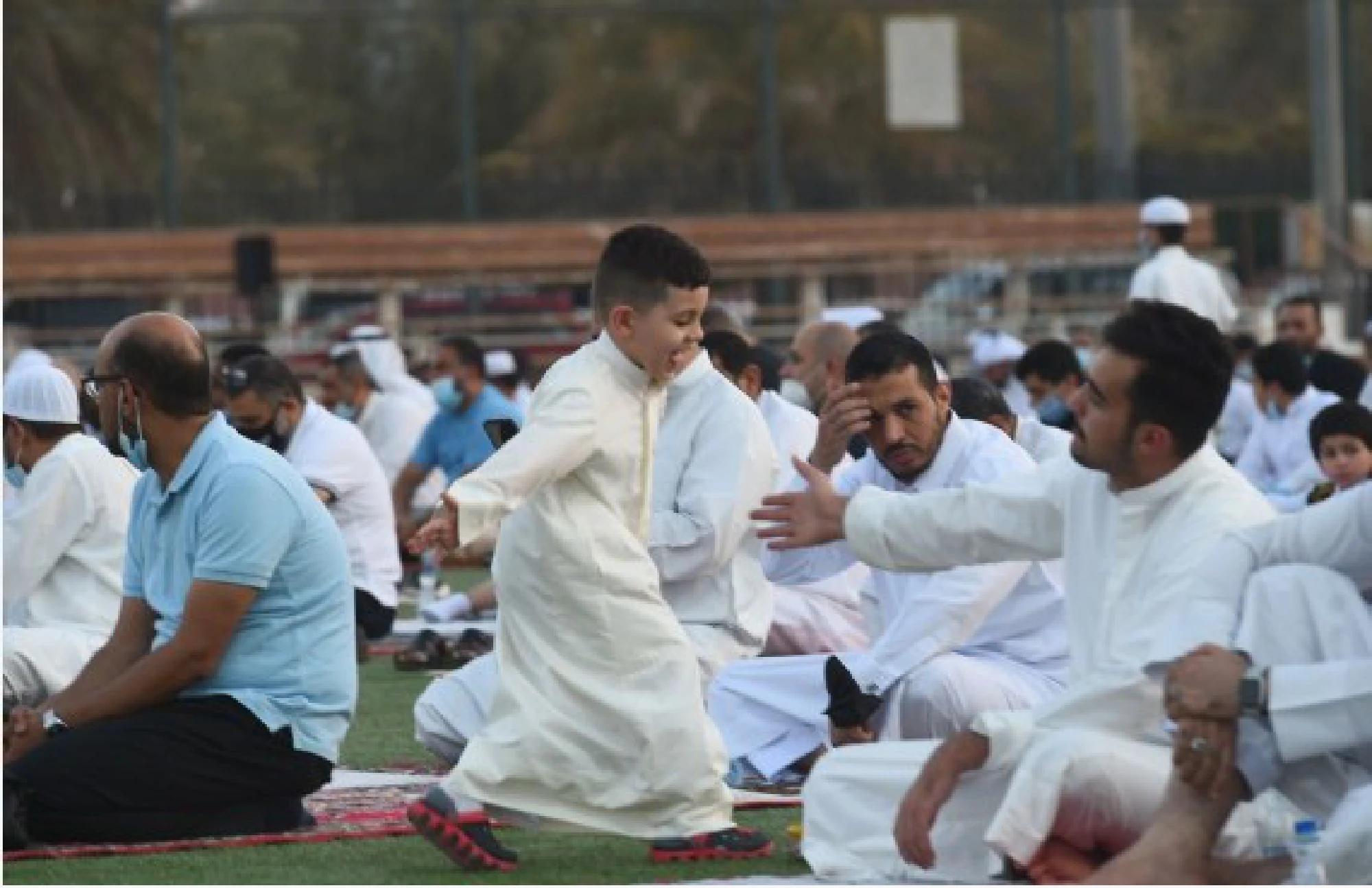 People perform prayers during Eid al-Adha holiday in Hawalli Governorate, Kuwait