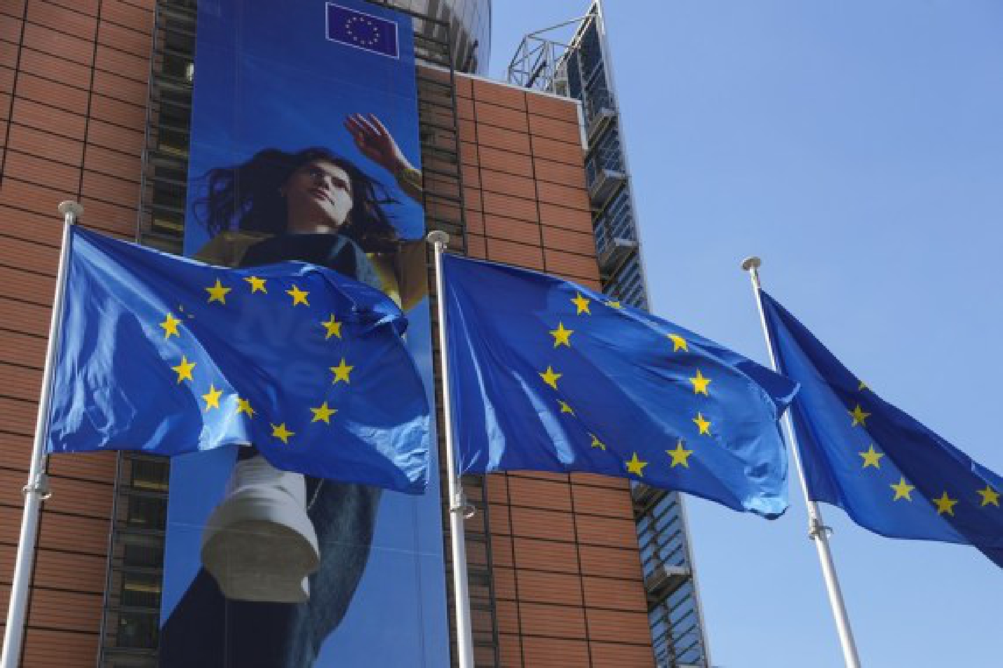 European Union flags fly outside the European Commission building in Brussels, Belgium, on June 9, 2021.