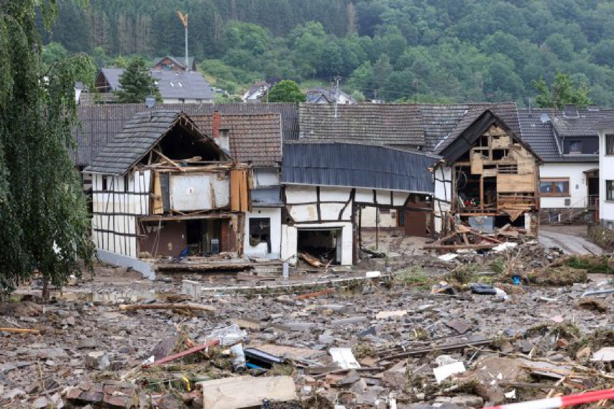 Photo taken on July 16, 2021 shows roads and houses damaged in flood in Schuld, a town in Ahrweiler, Germany.