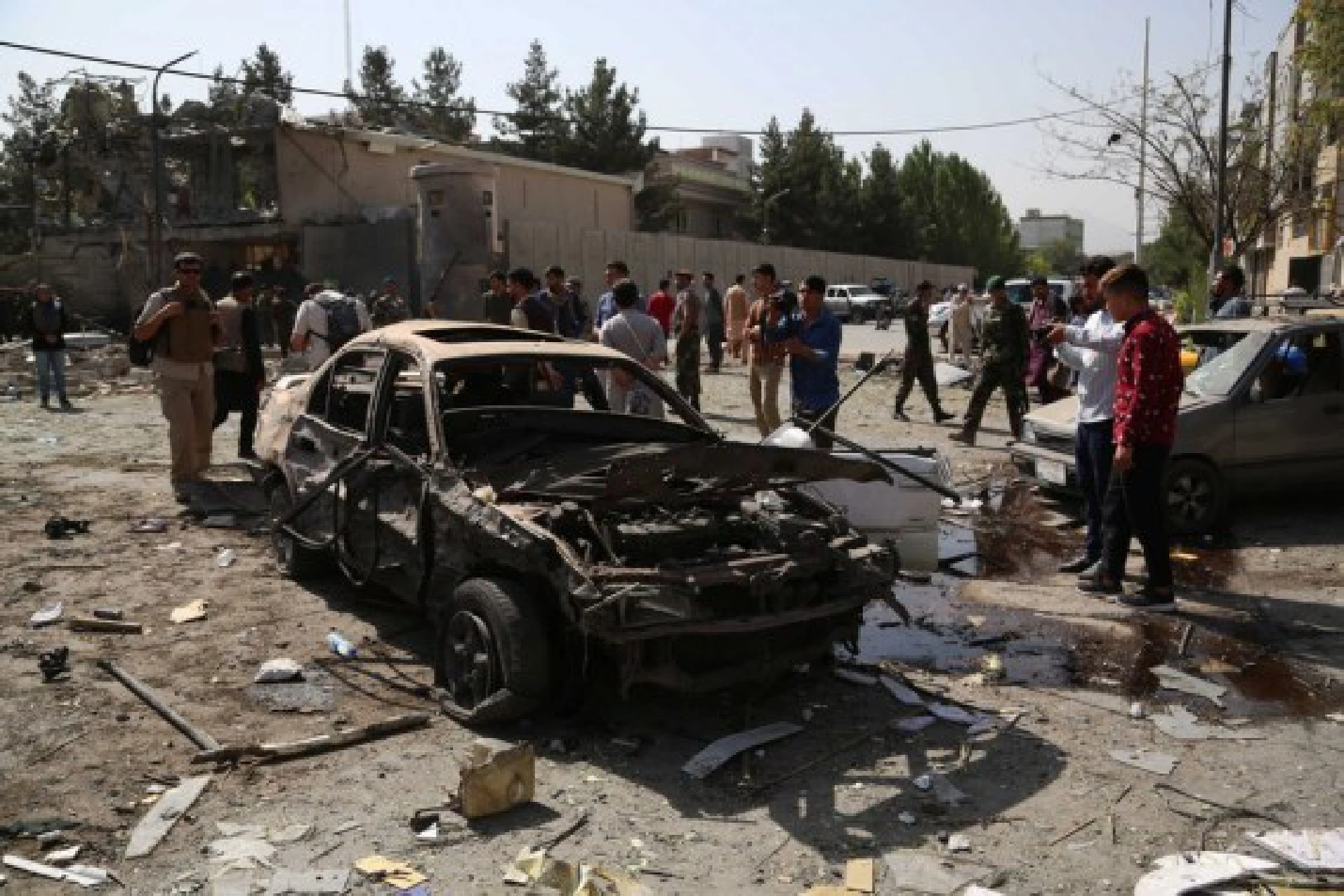 Photo taken on Aug. 4, 2021 shows damaged vehicles at the site of a car bomb in Kabul, capital of Afghanistan.
